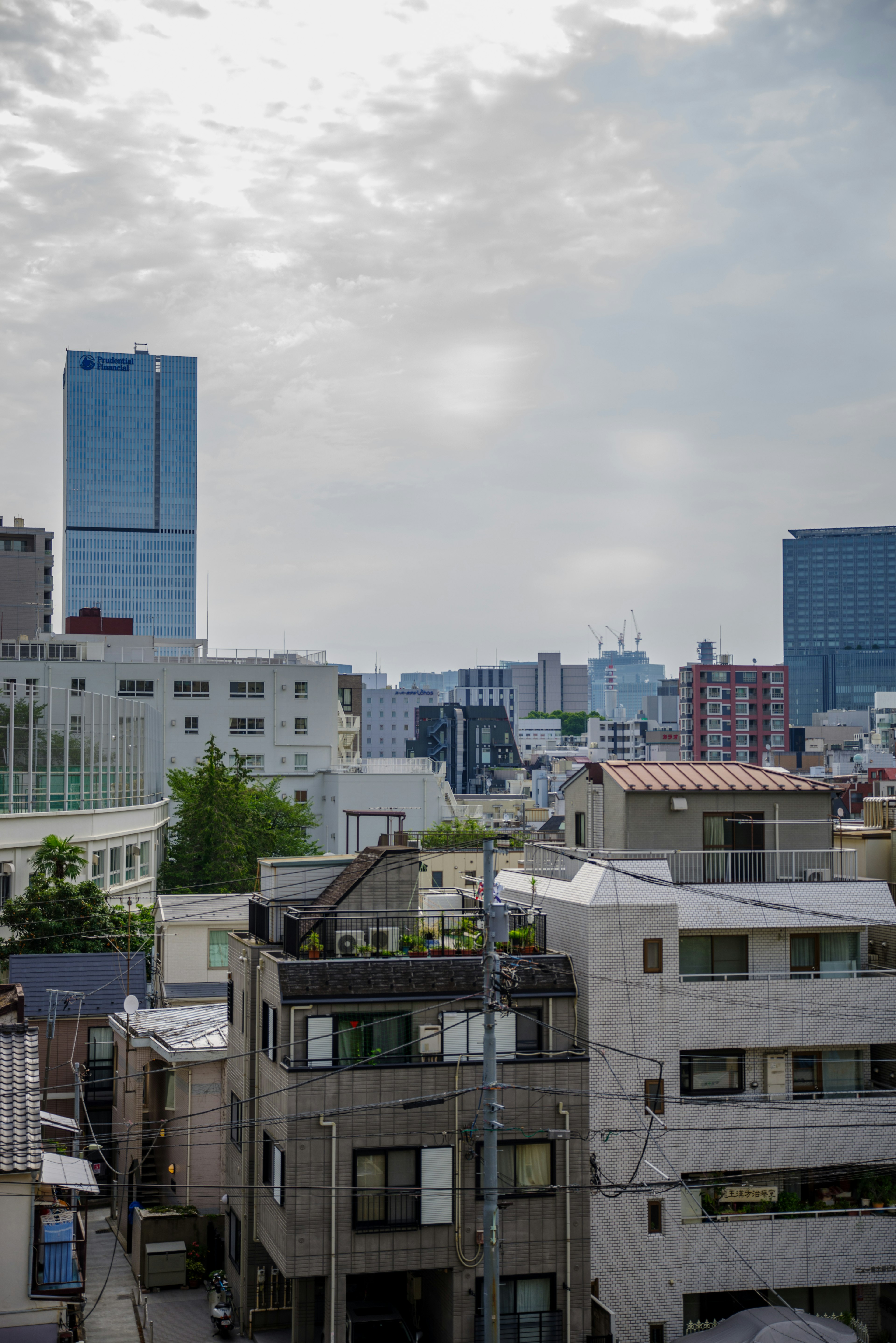 Urban landscape featuring a mix of skyscrapers and residential buildings