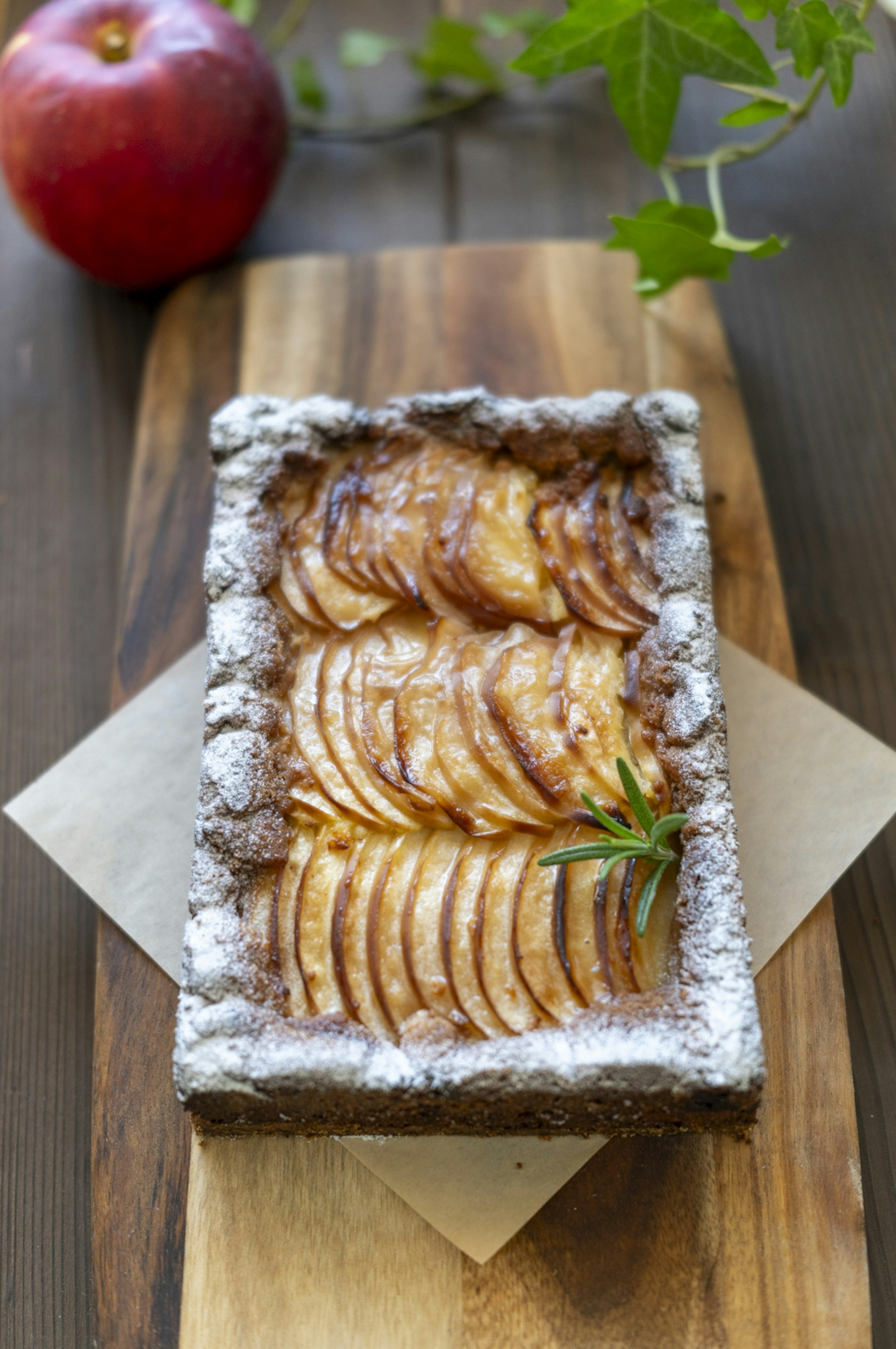 Beautiful apple tart placed on a wooden board