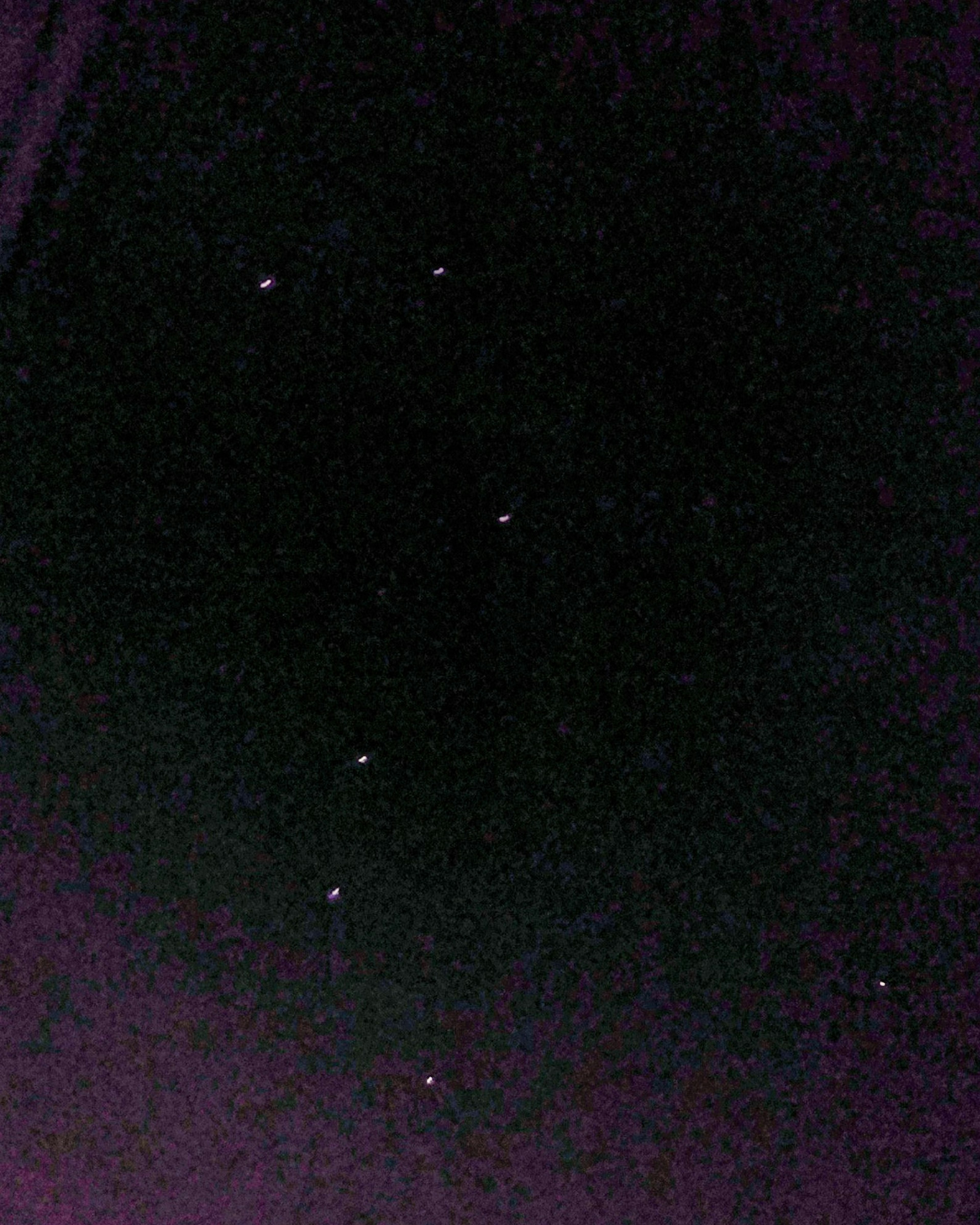 Image of scattered stars against a dark background