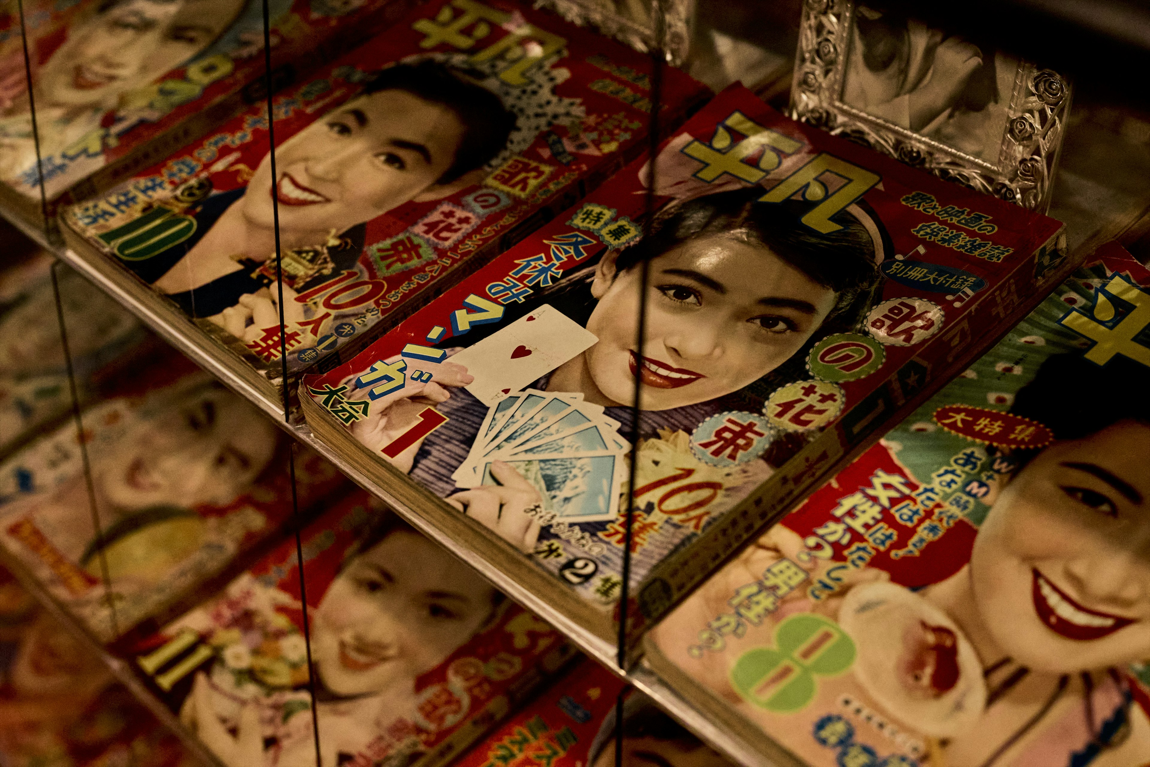 A display of vintage magazine covers featuring smiling women