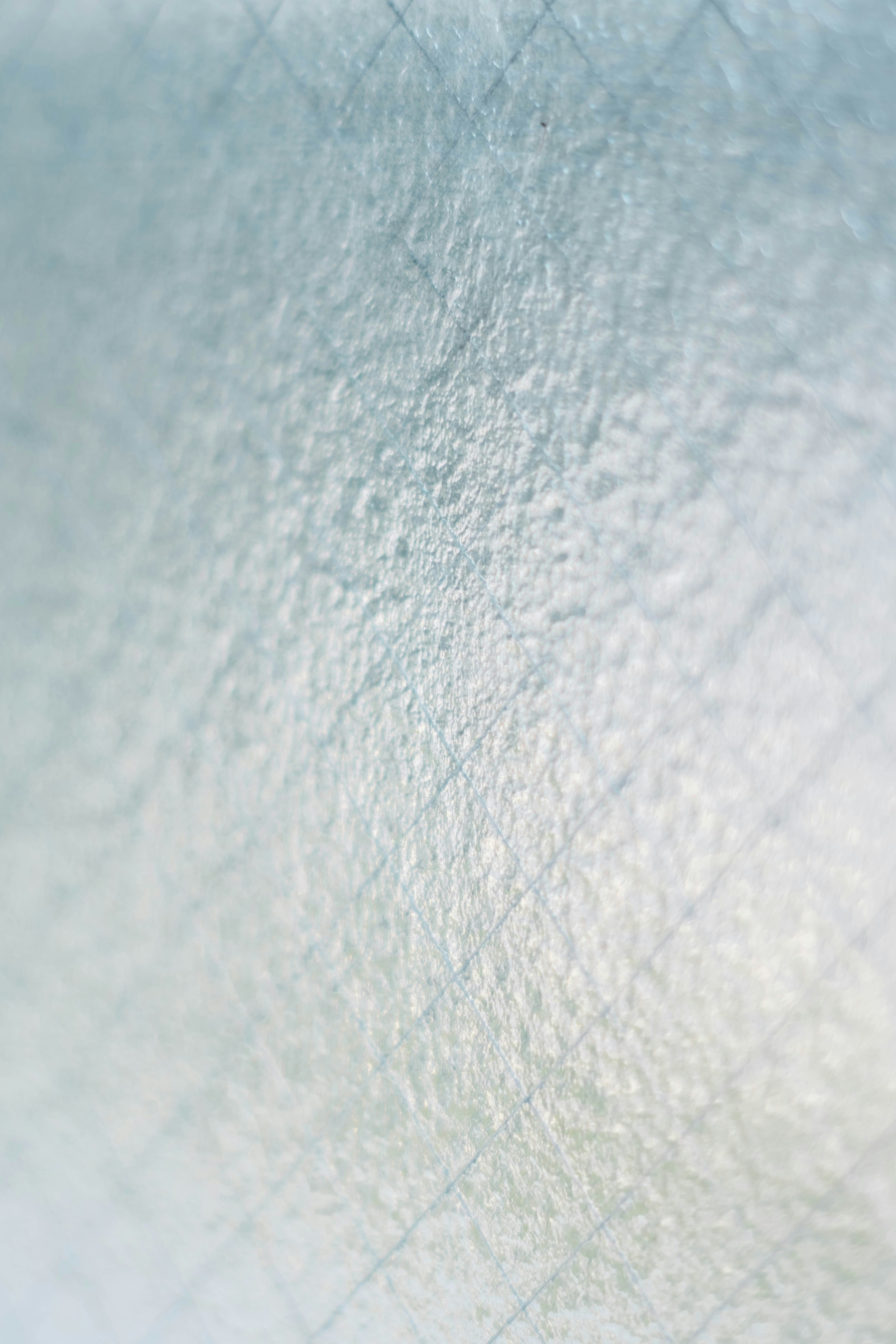 Close-up of a translucent bluish texture