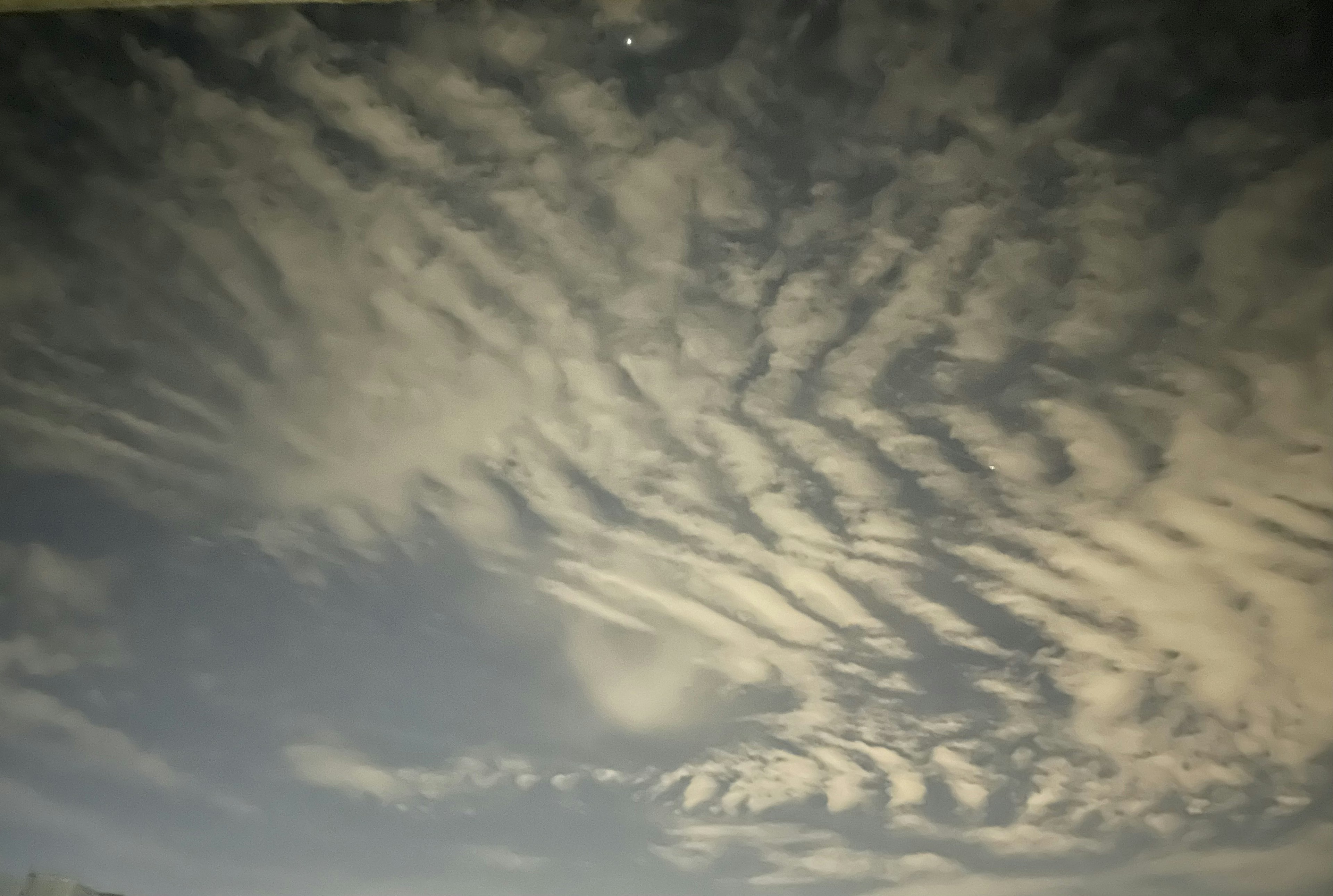 Wavy cloud patterns in the sky