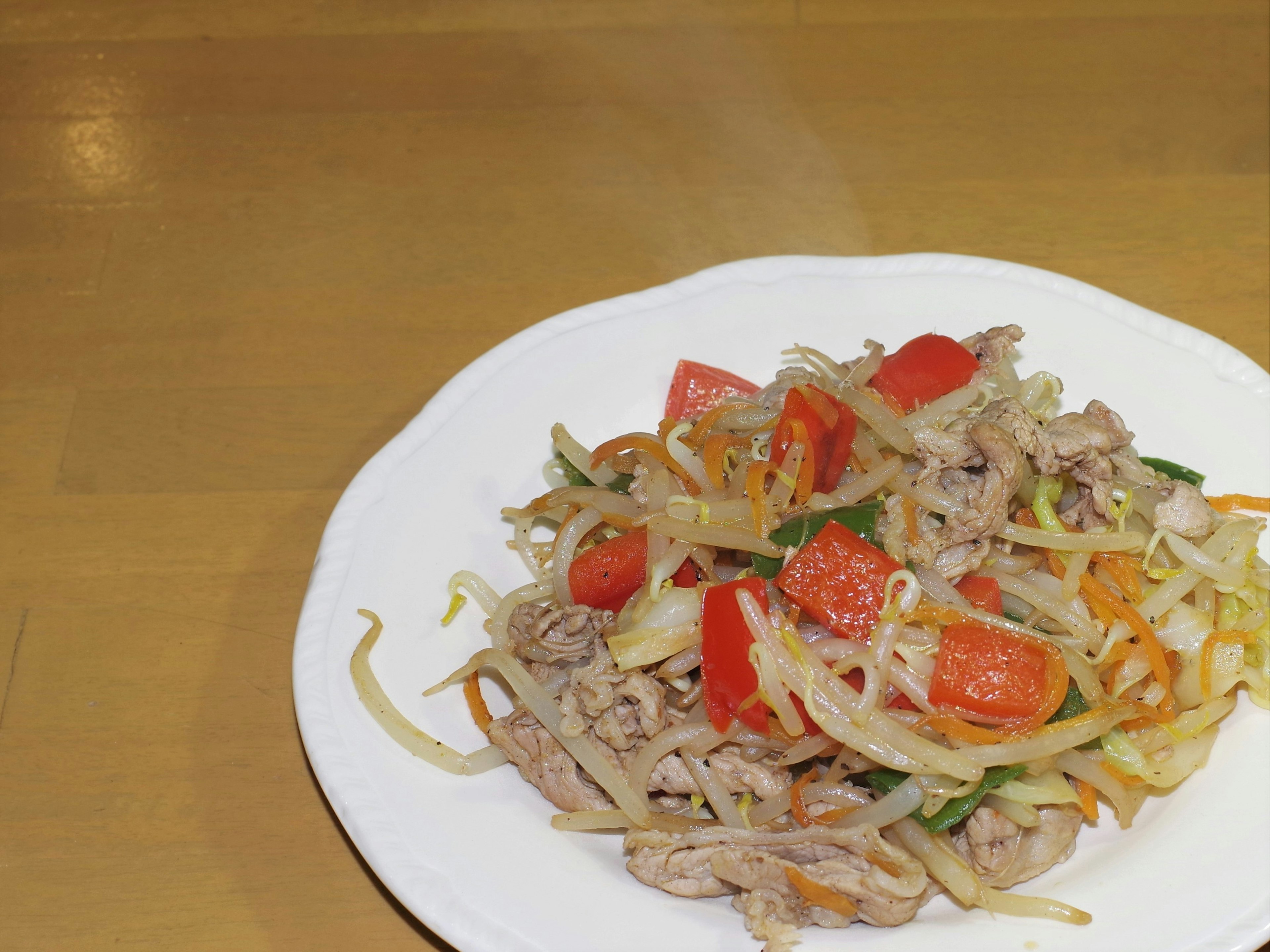 Stir-fried vegetables and meat on a plate