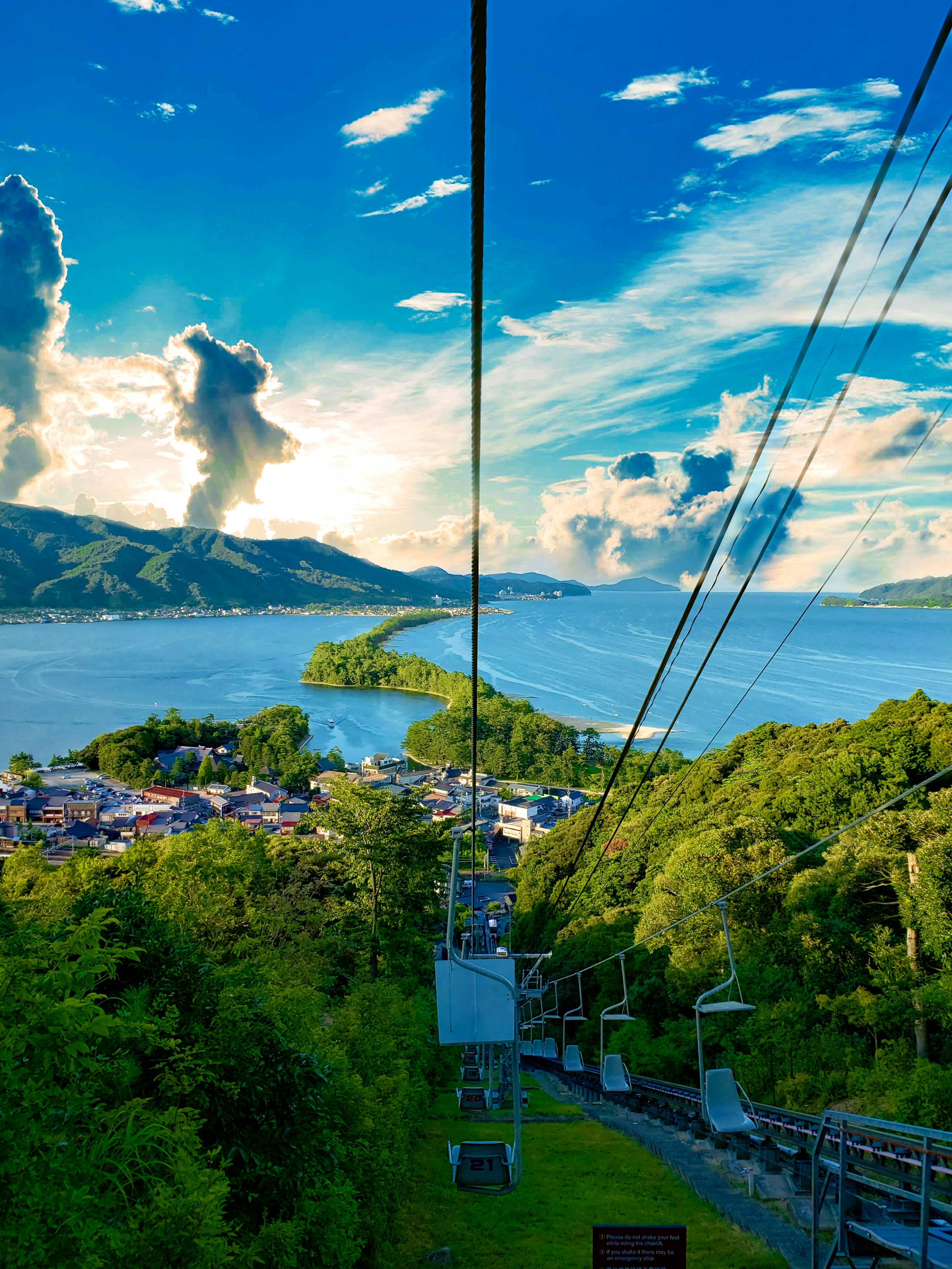 Scenic view of mountains and lake from a cable car