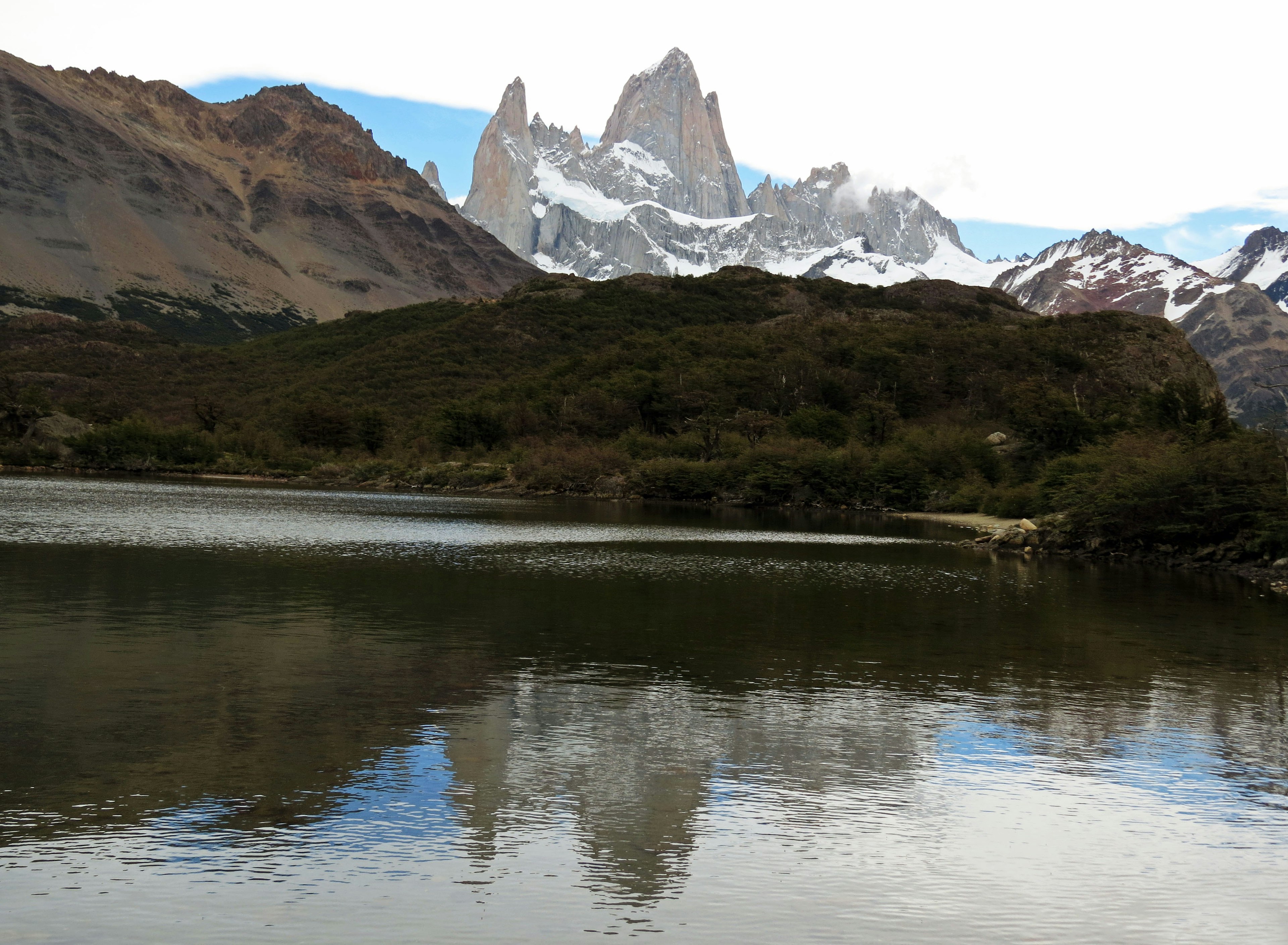 Scenic view of a lake reflecting mountains