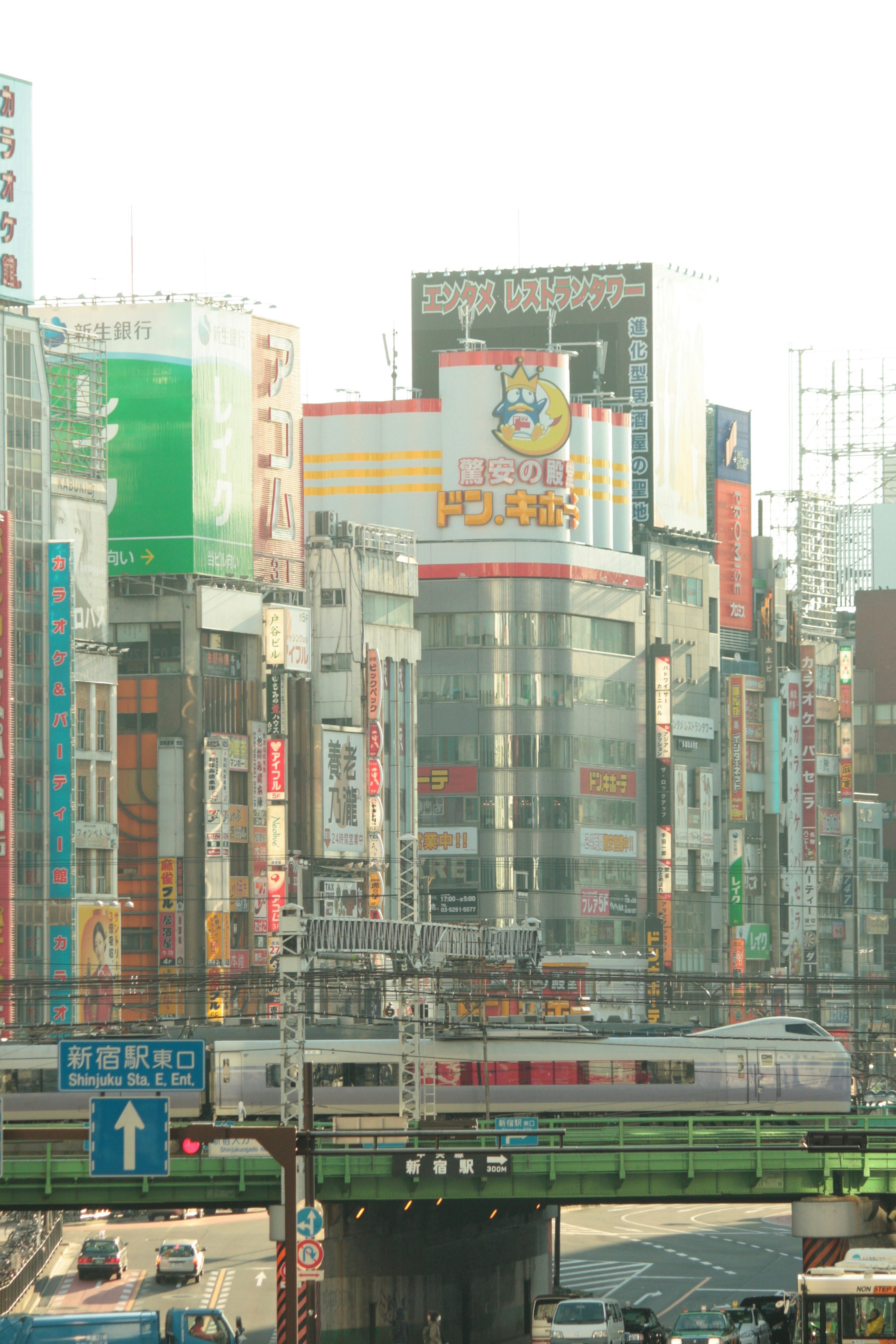 Urban landscape with skyscrapers and colorful advertisements