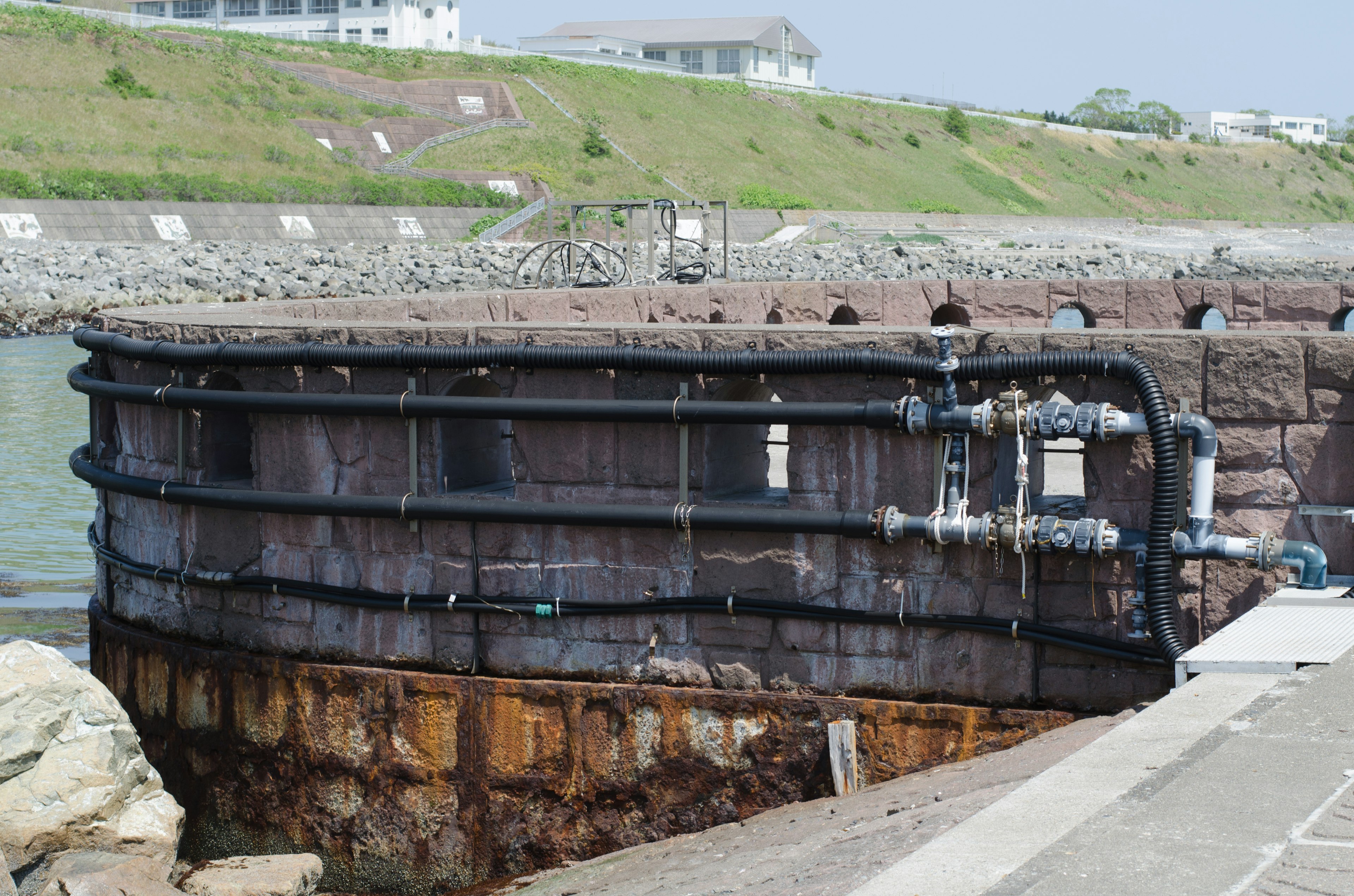 Old seawall structure facing the sea