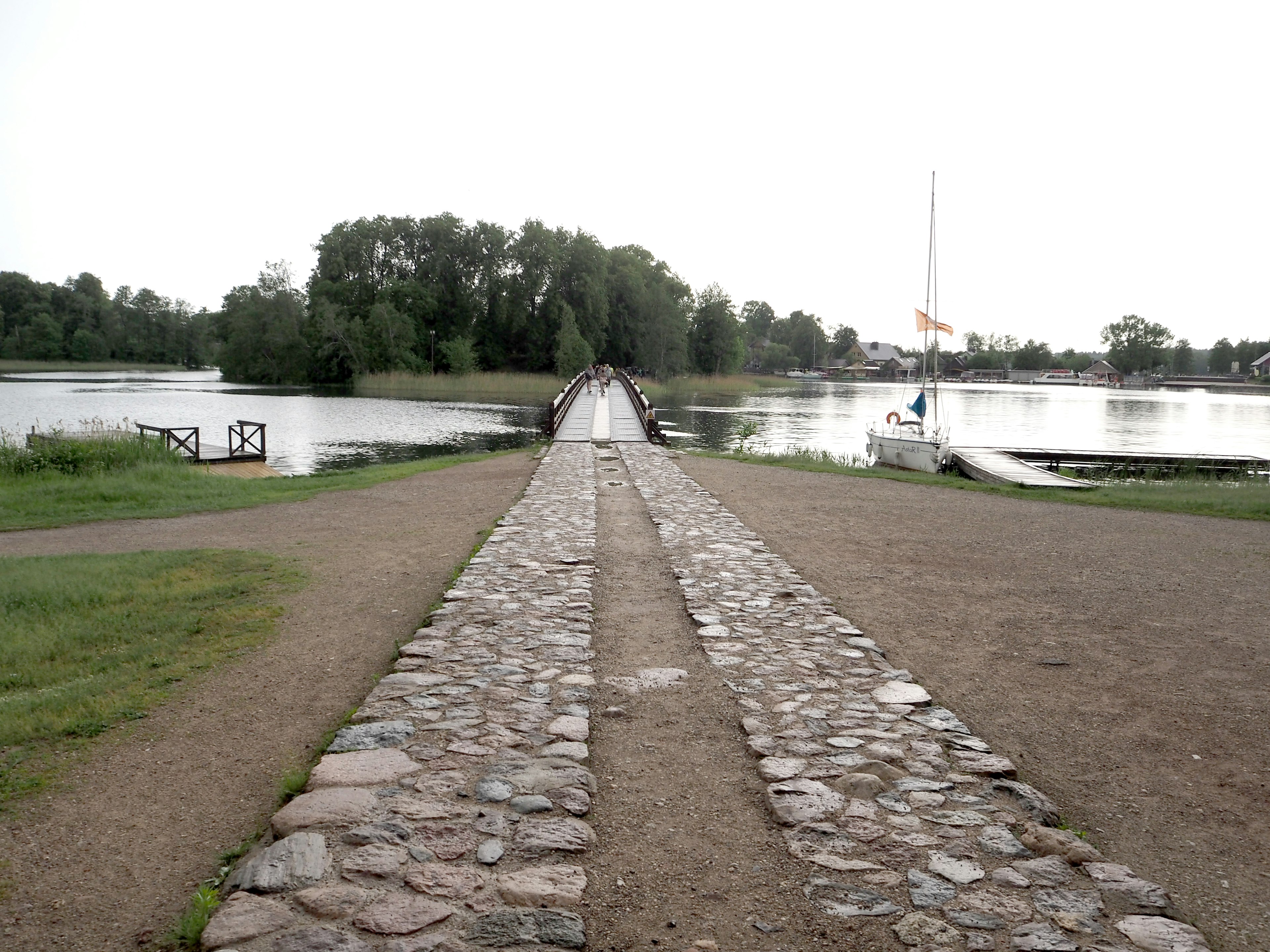 Stone path leading to a serene waterfront