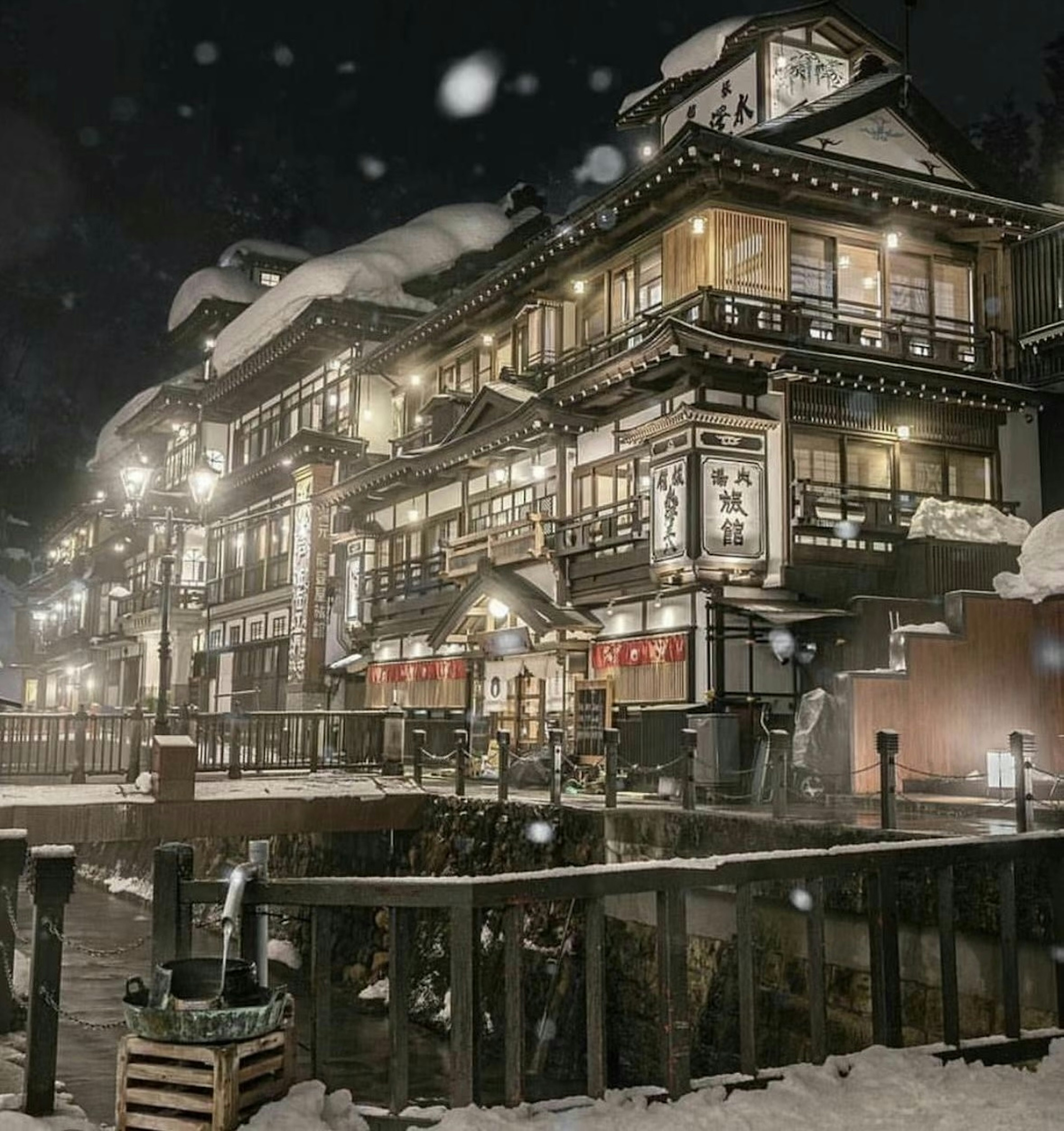 Night view of a traditional Japanese ryokan covered in snow