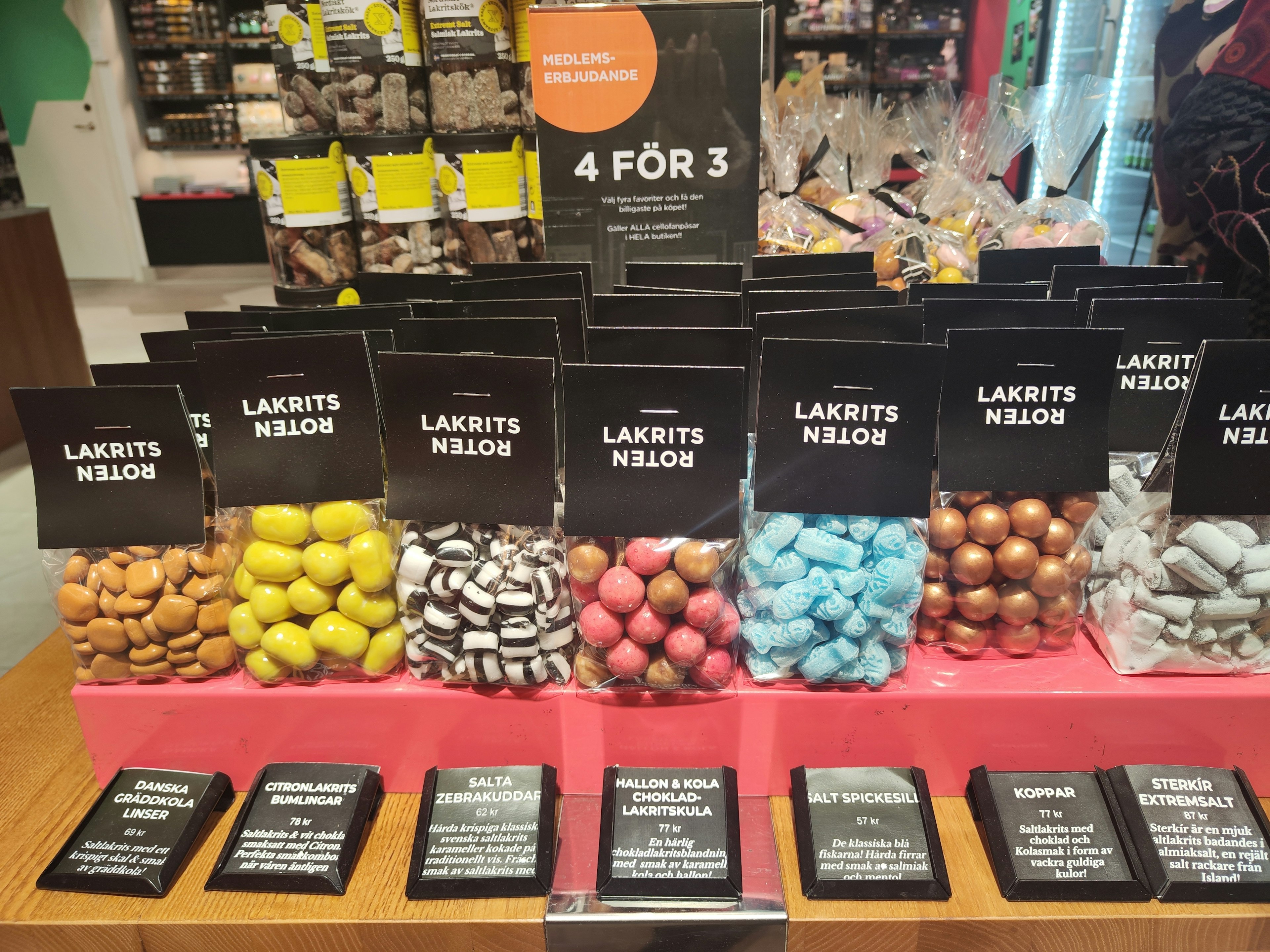 Display of colorful candy bags arranged in a store