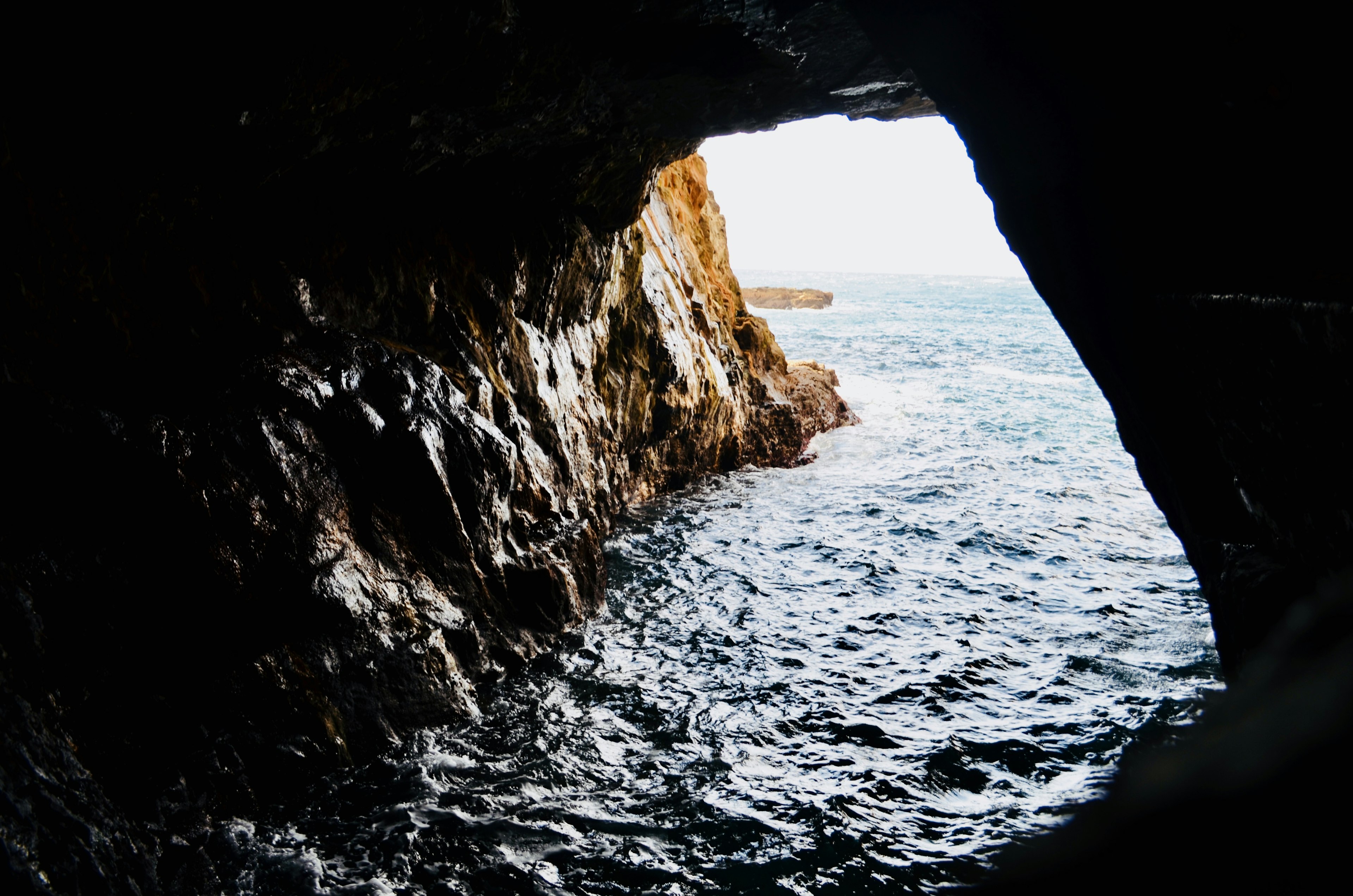 View of the ocean from a rocky cave