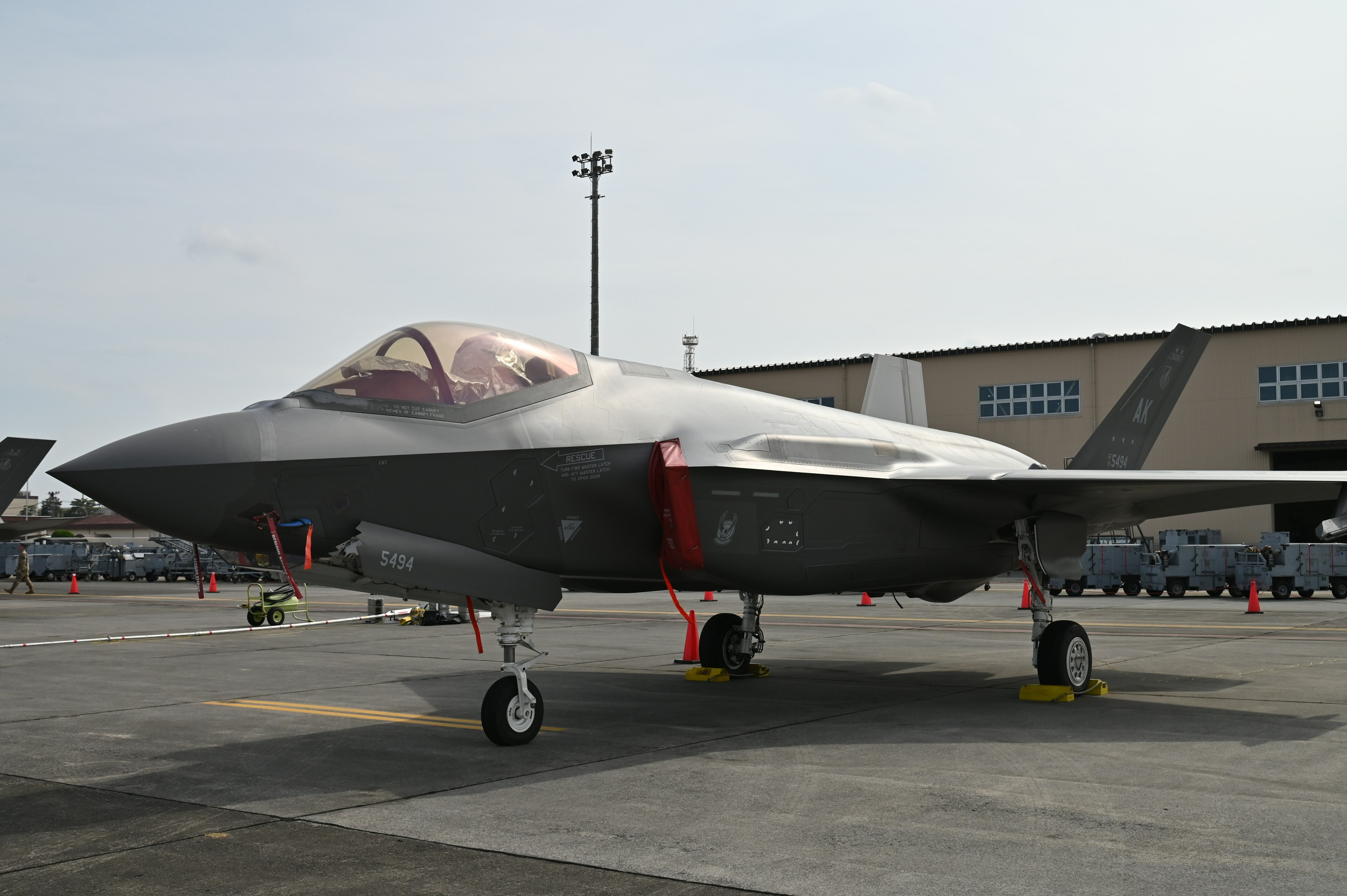 A modern fighter jet parked on the runway