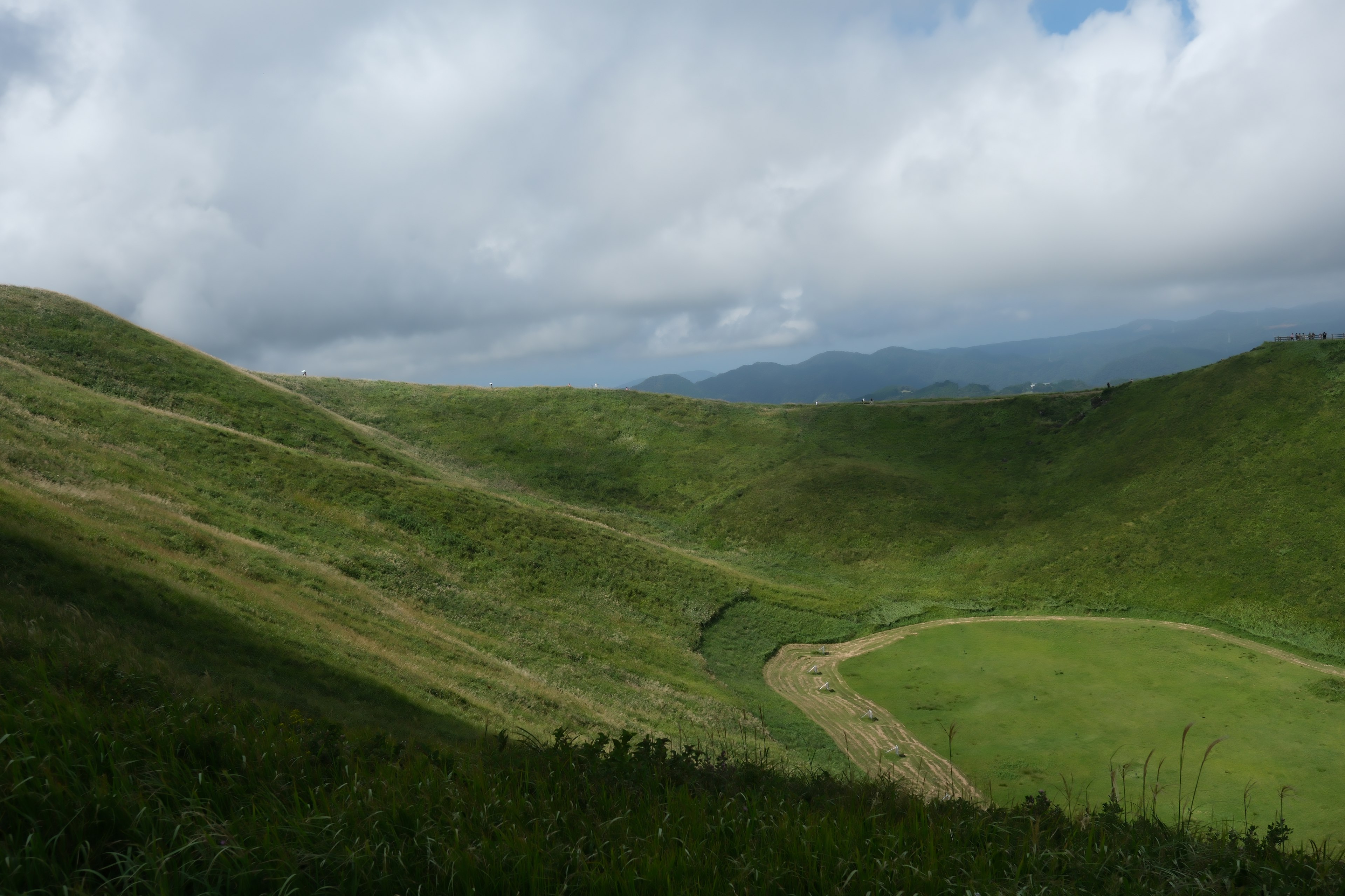 Green hills with a cloudy sky