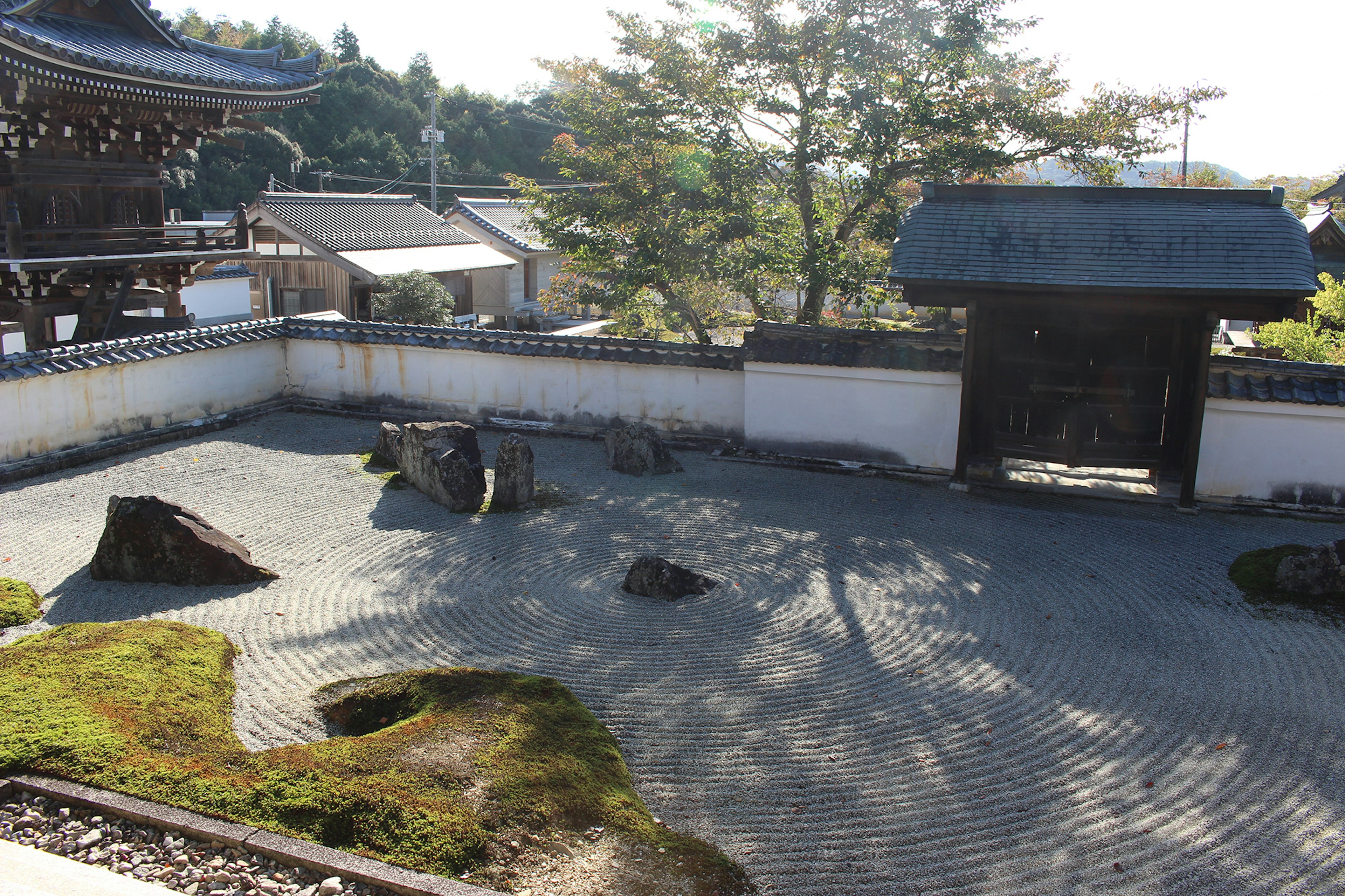 Japanese garden scene with gravel patterns and rocks