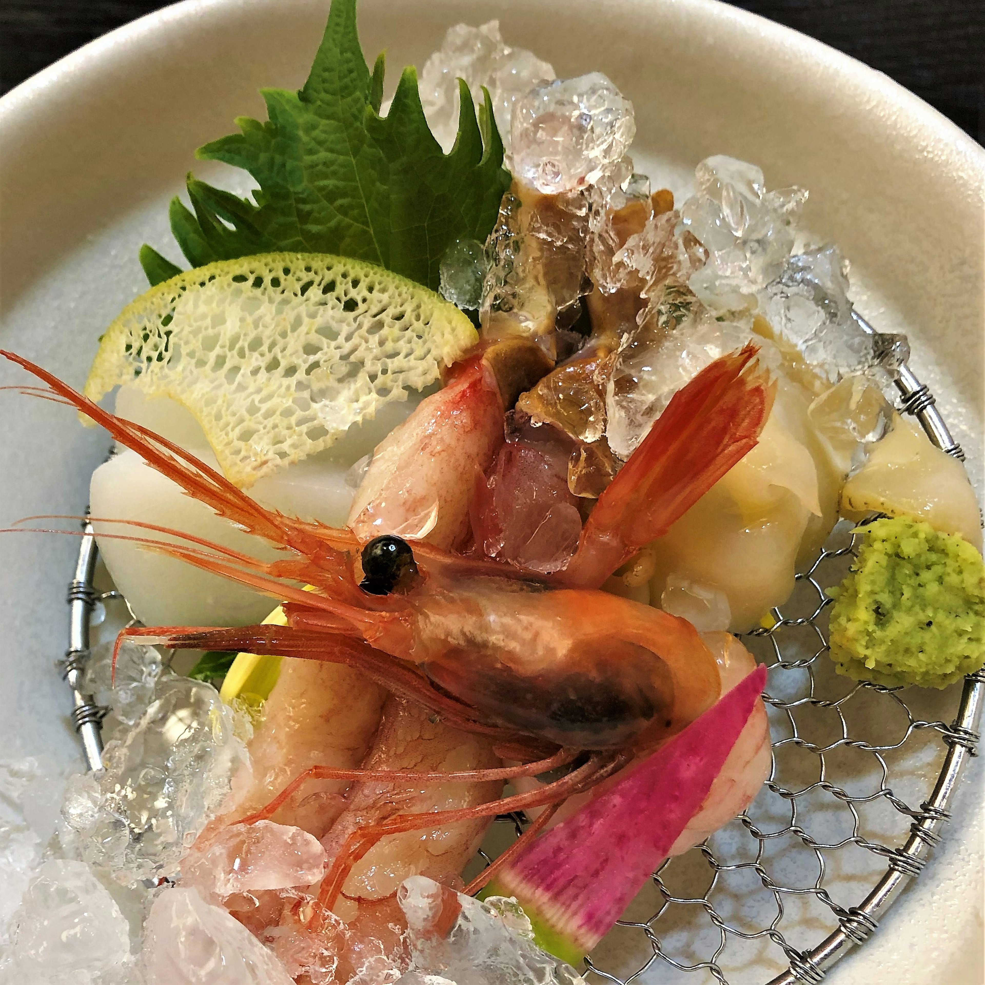 Fresh seafood platter with ice and garnishes