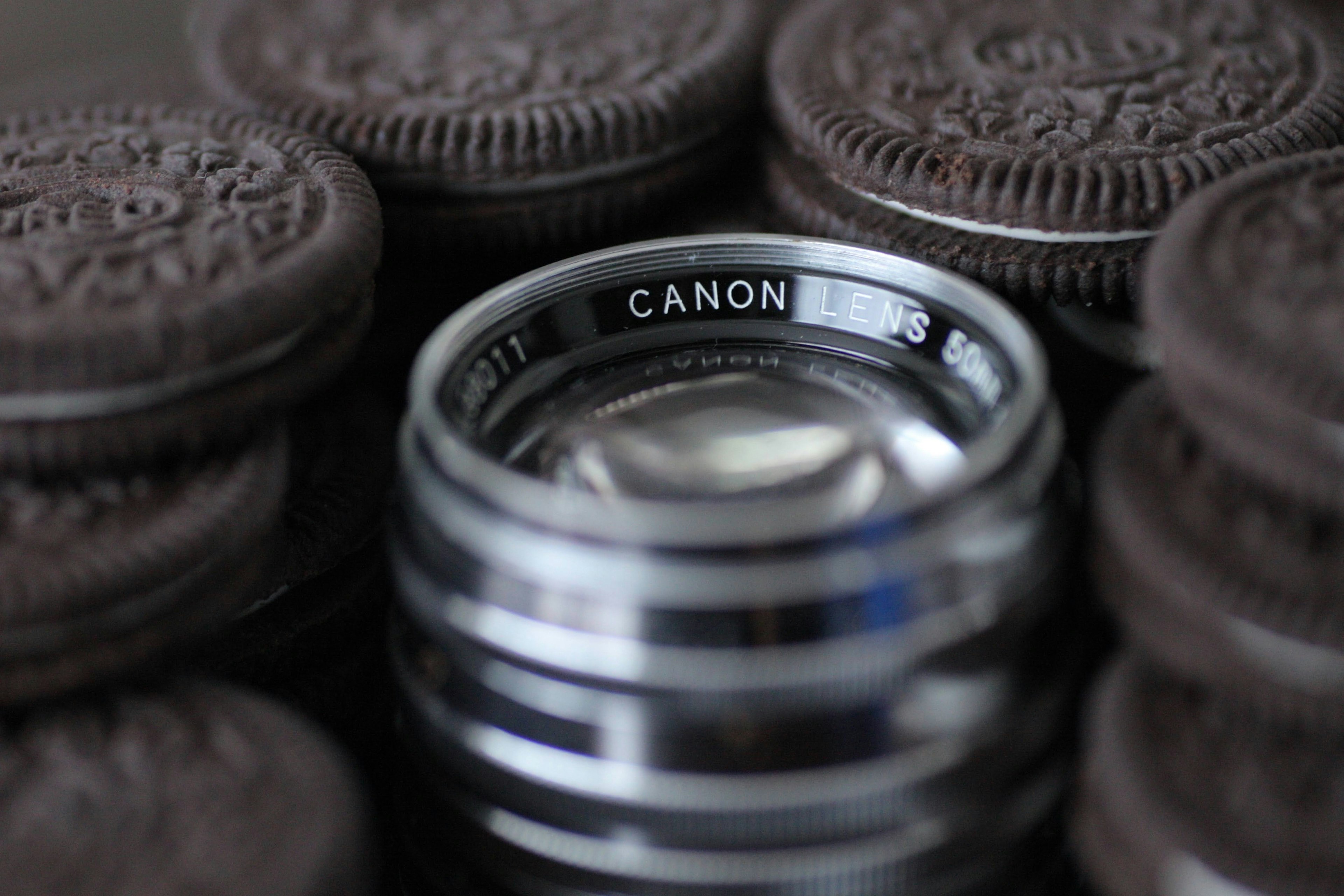 Close-up of a camera lens surrounded by cookies