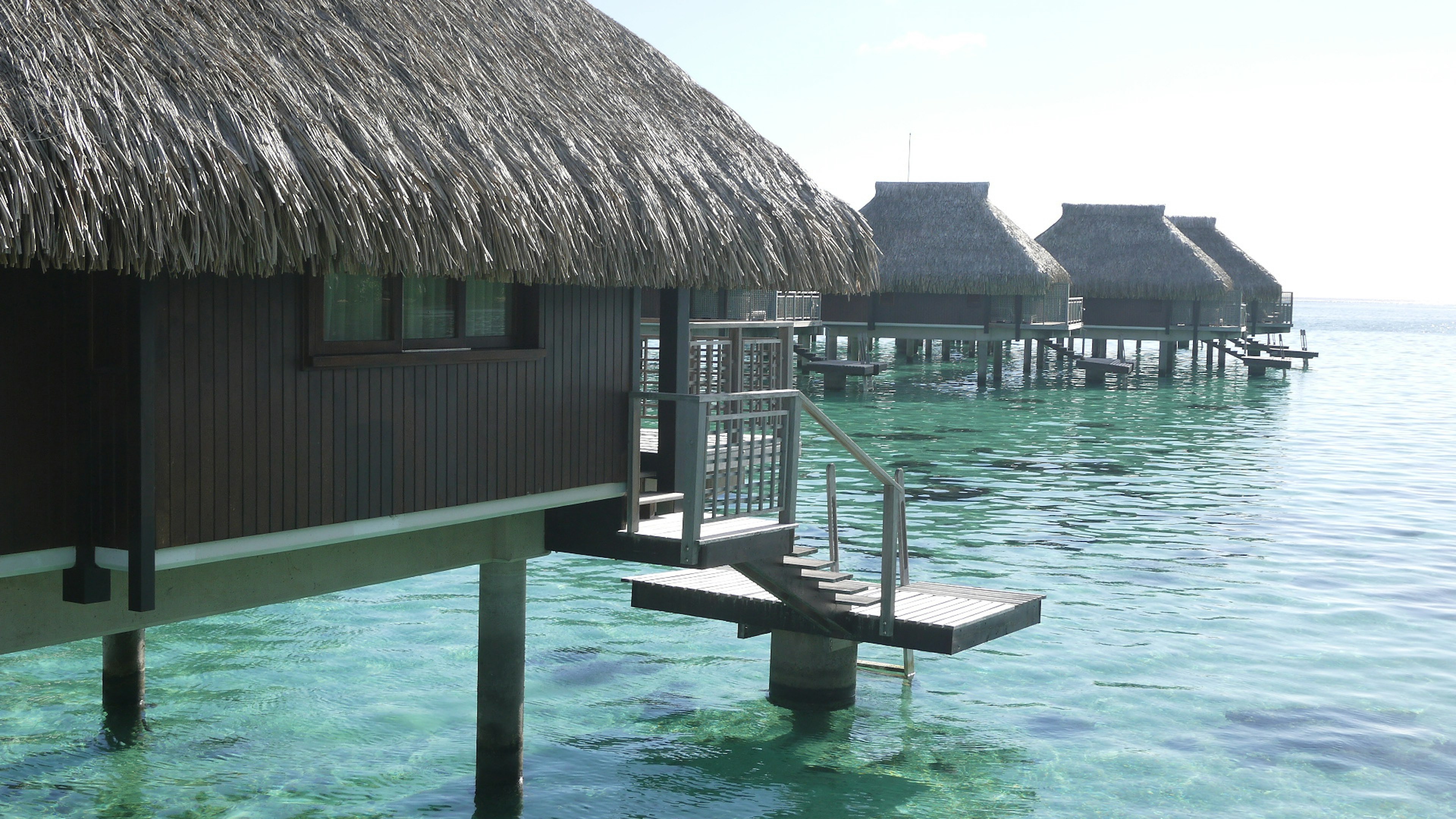 Overwater bungalows and clear ocean view