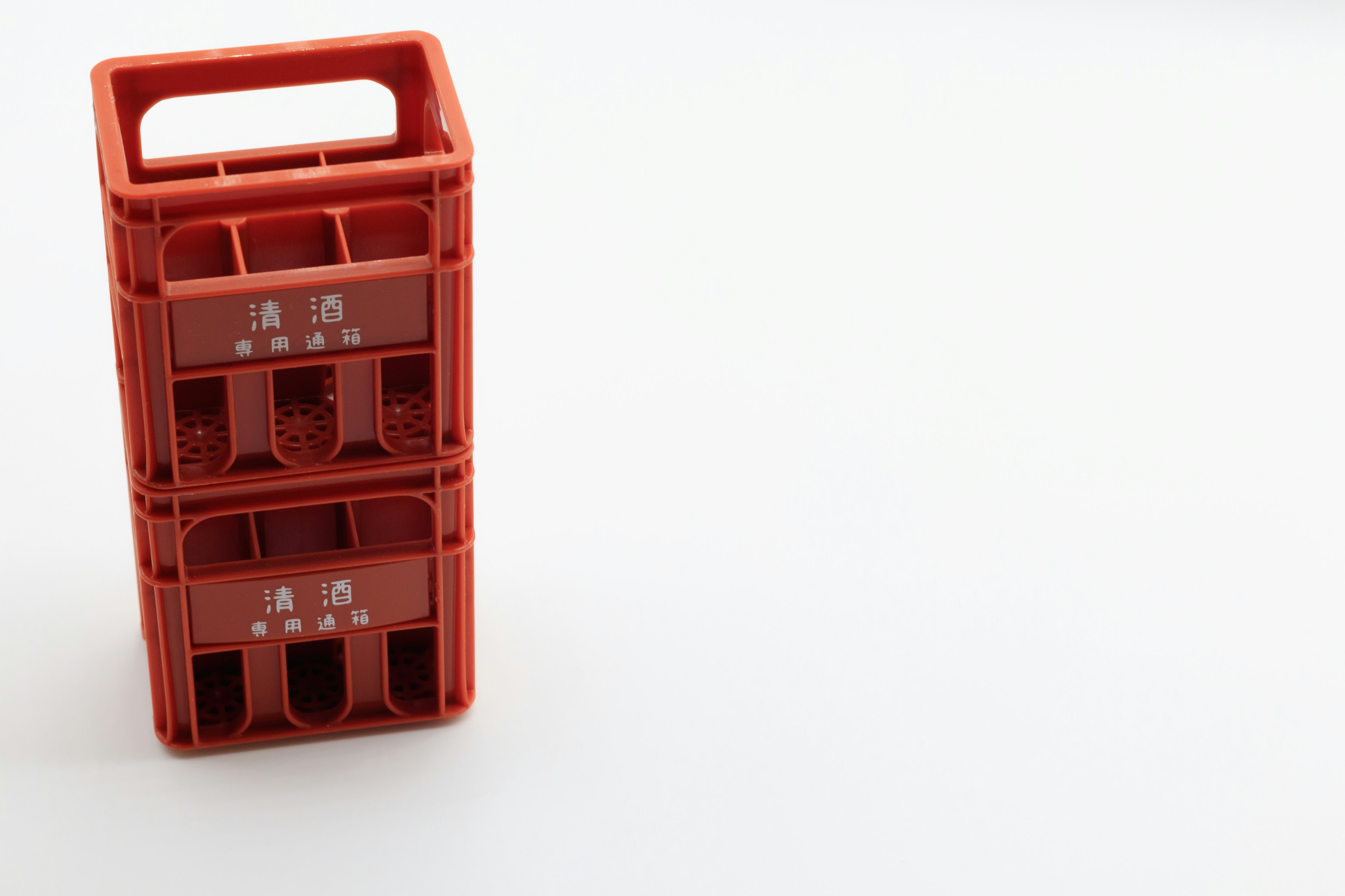 Stacked red plastic crates with a simple design