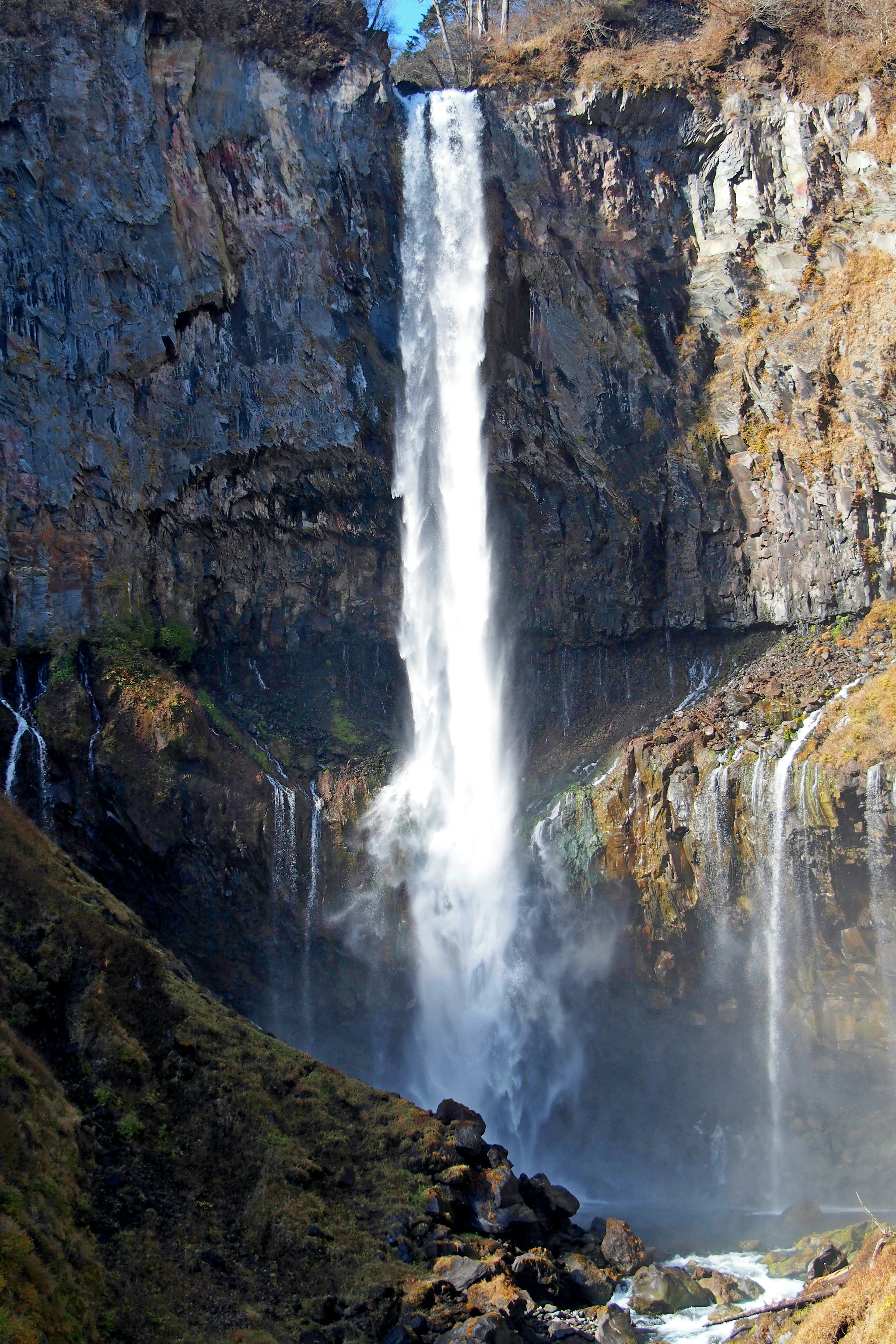 Stunning waterfall cascading down rocky cliffs