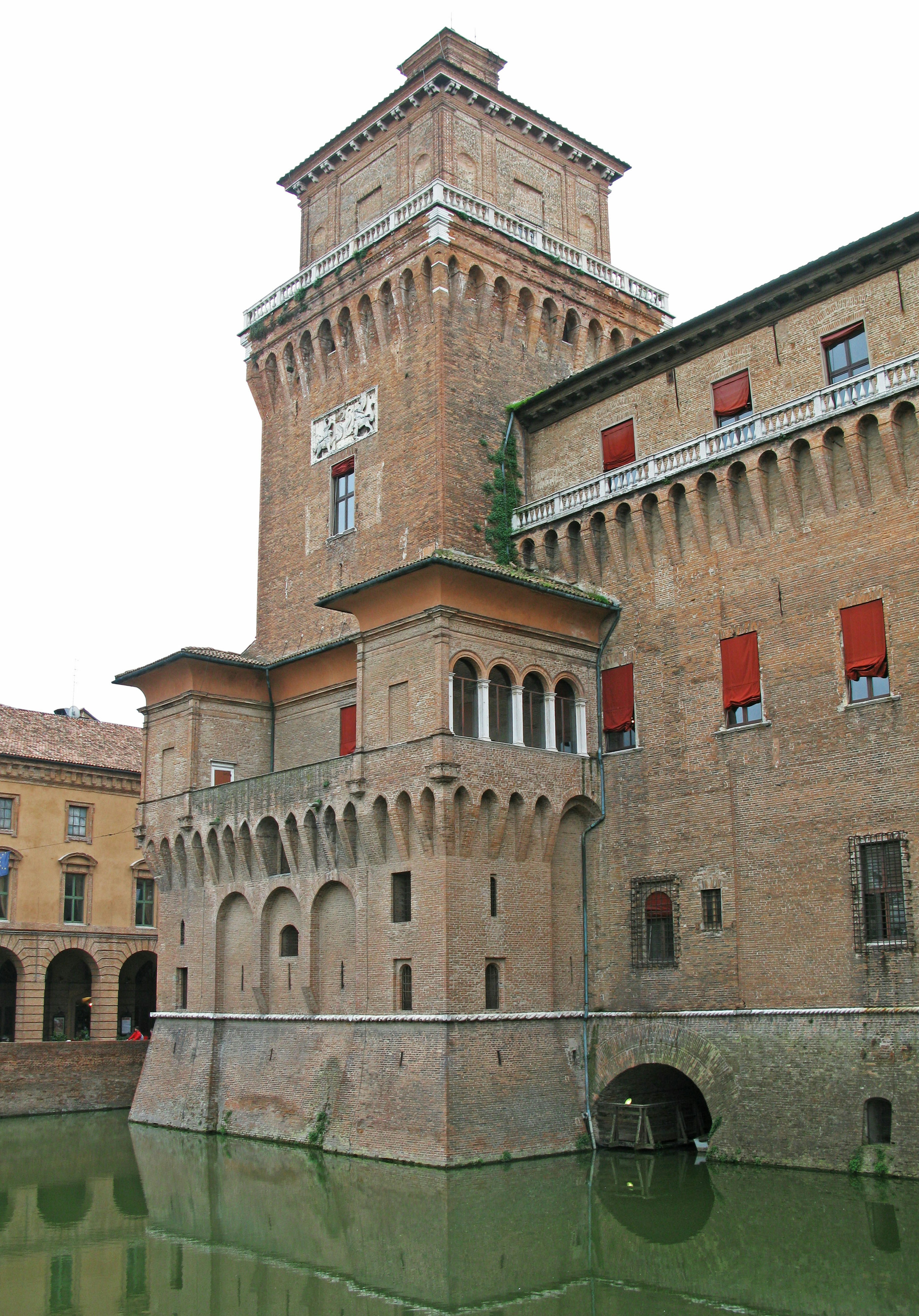 Beautiful exterior of Estense Castle reflecting in the water