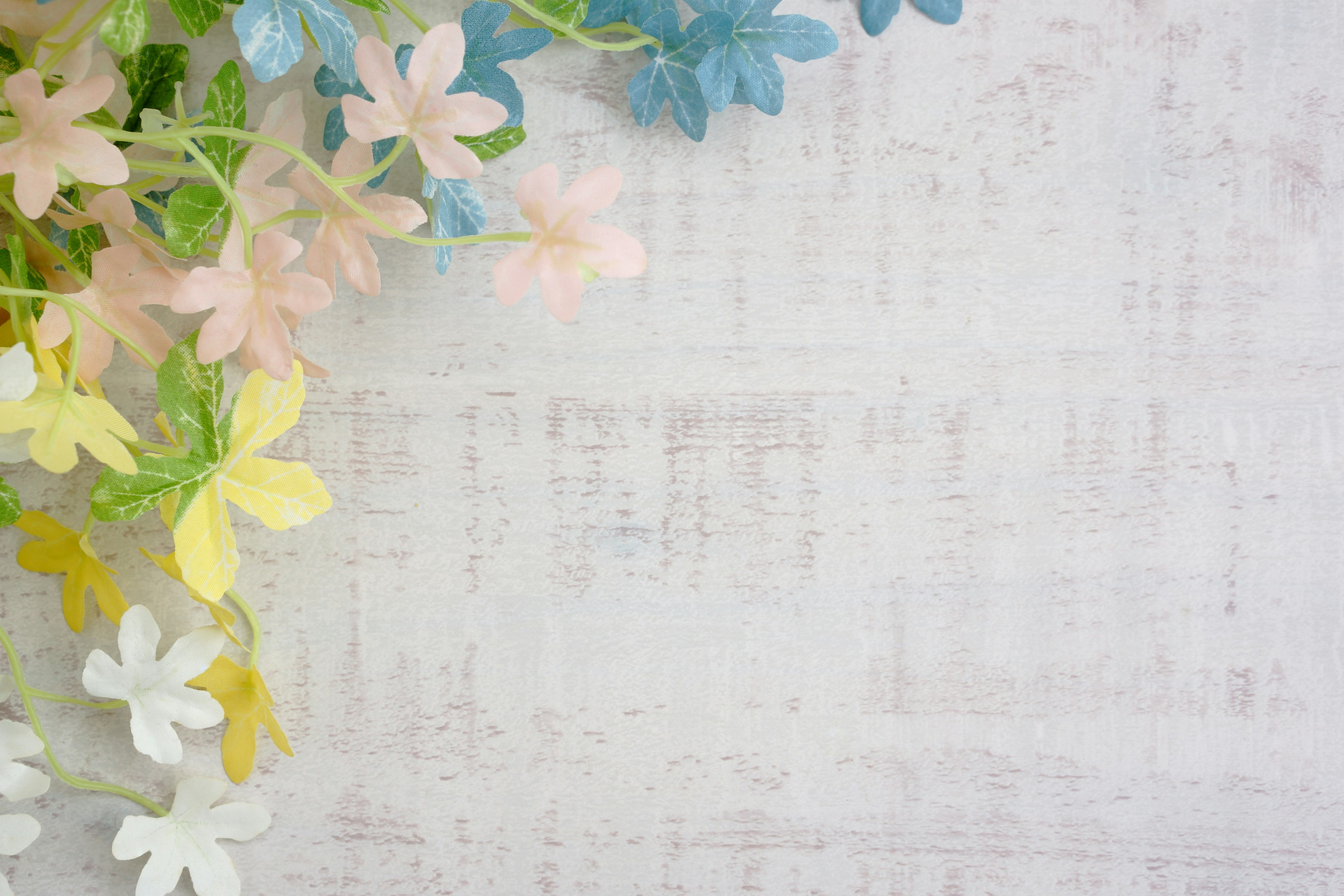 Image of a background with pastel colored flowers