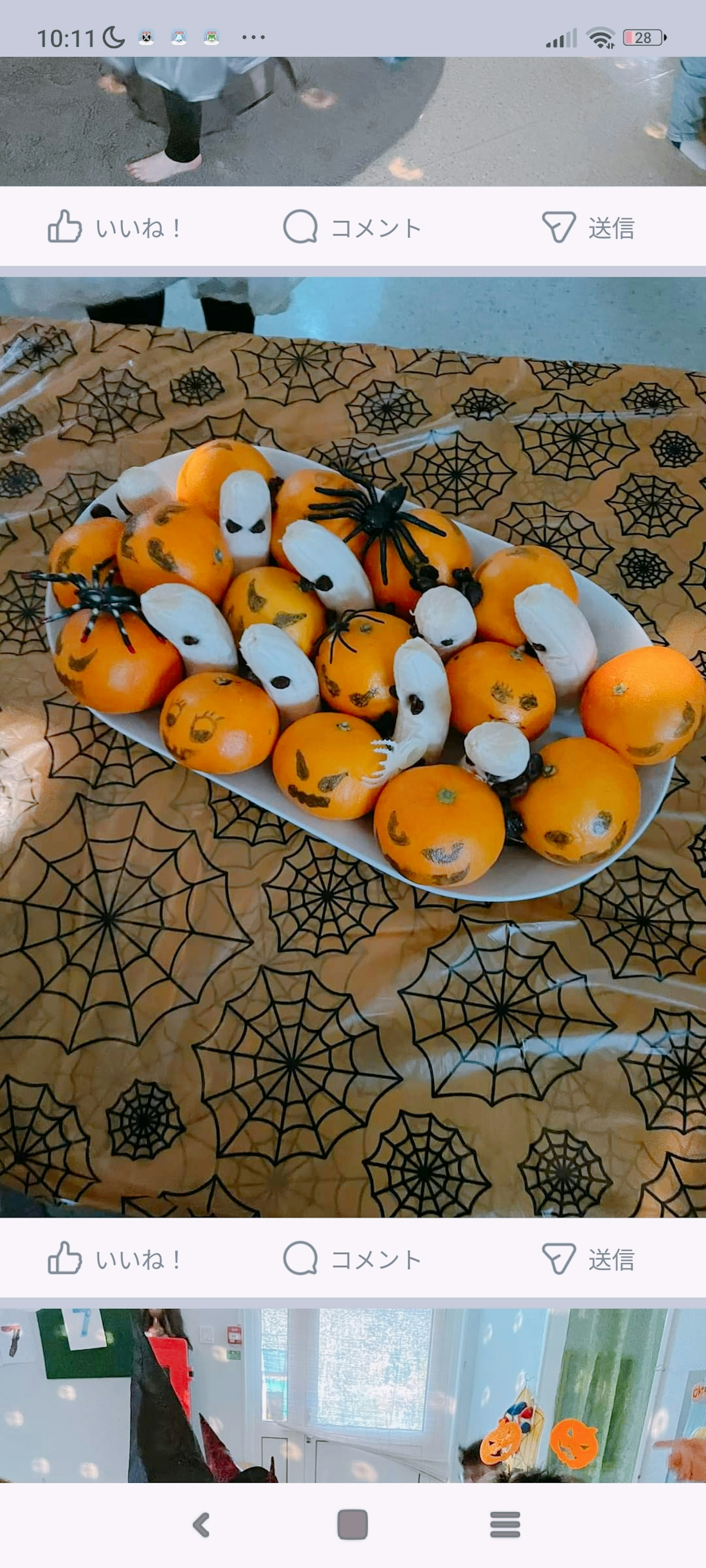 A platter of orange mini pumpkins and ghost decorations