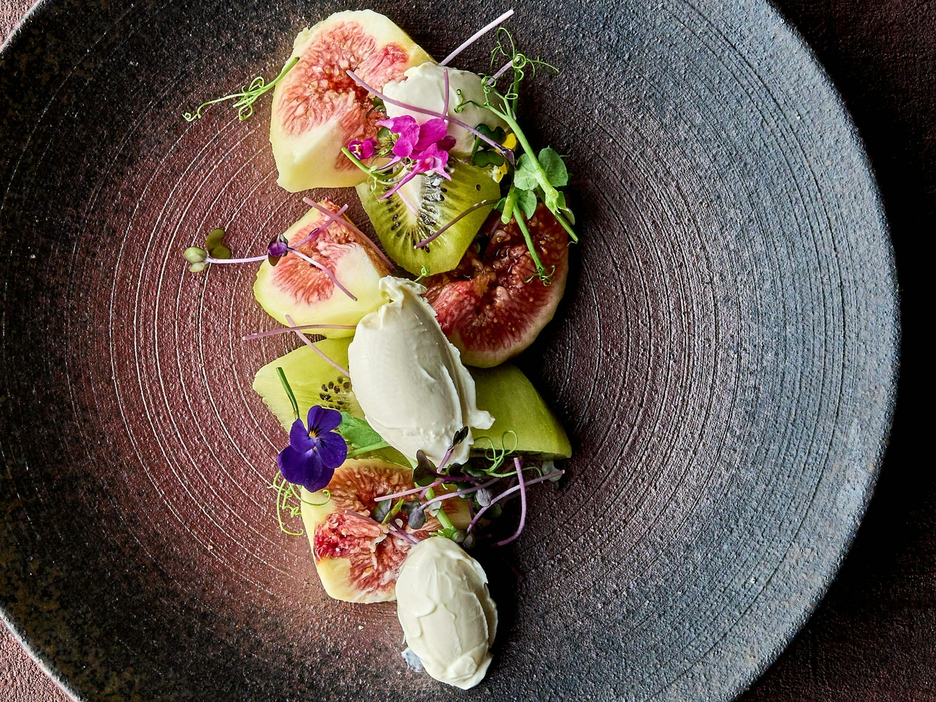 Beautiful dessert plate featuring figs and ice cream