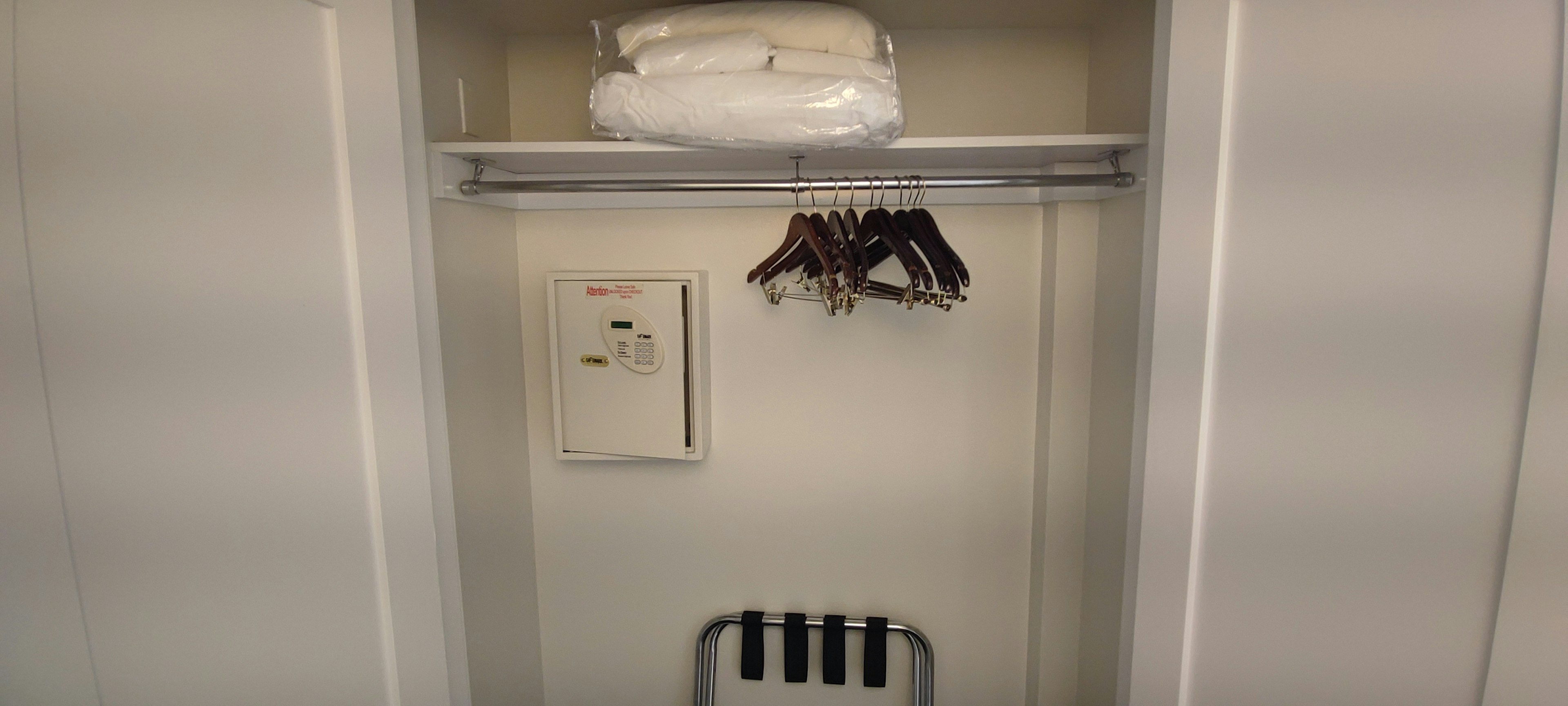 Interior of a closet with towels and hangers