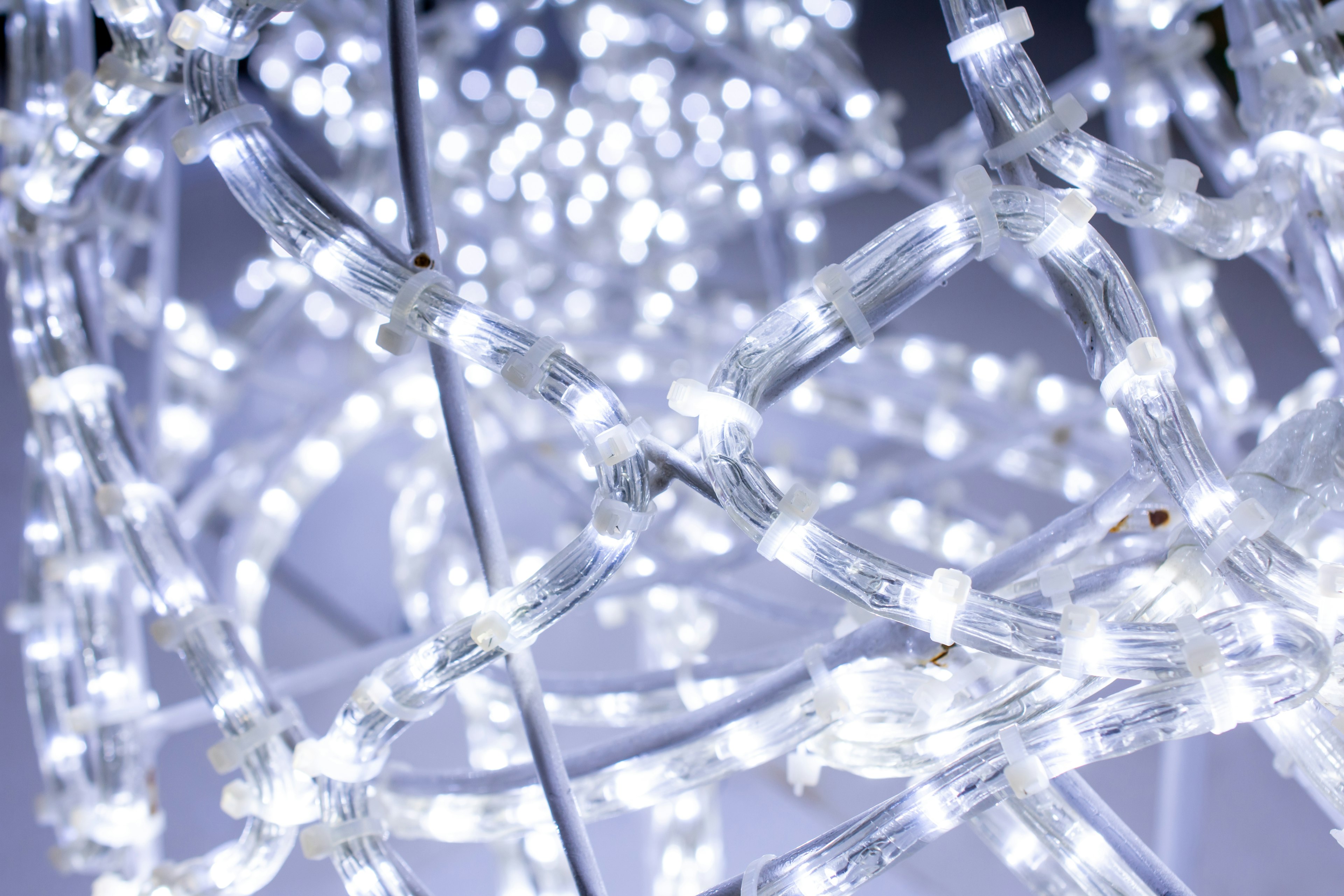 Intertwined white LED lights creating a decorative pattern