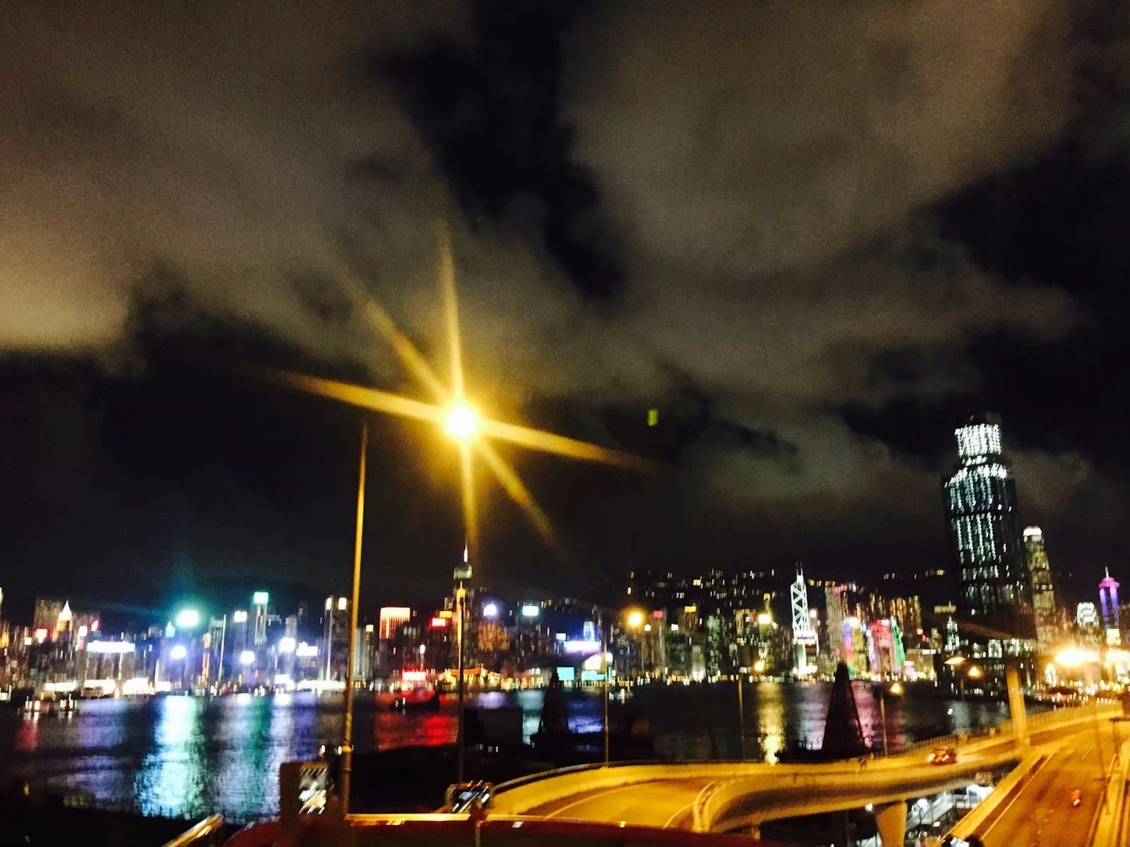 Beautiful night view of Hong Kong with bright illuminated buildings