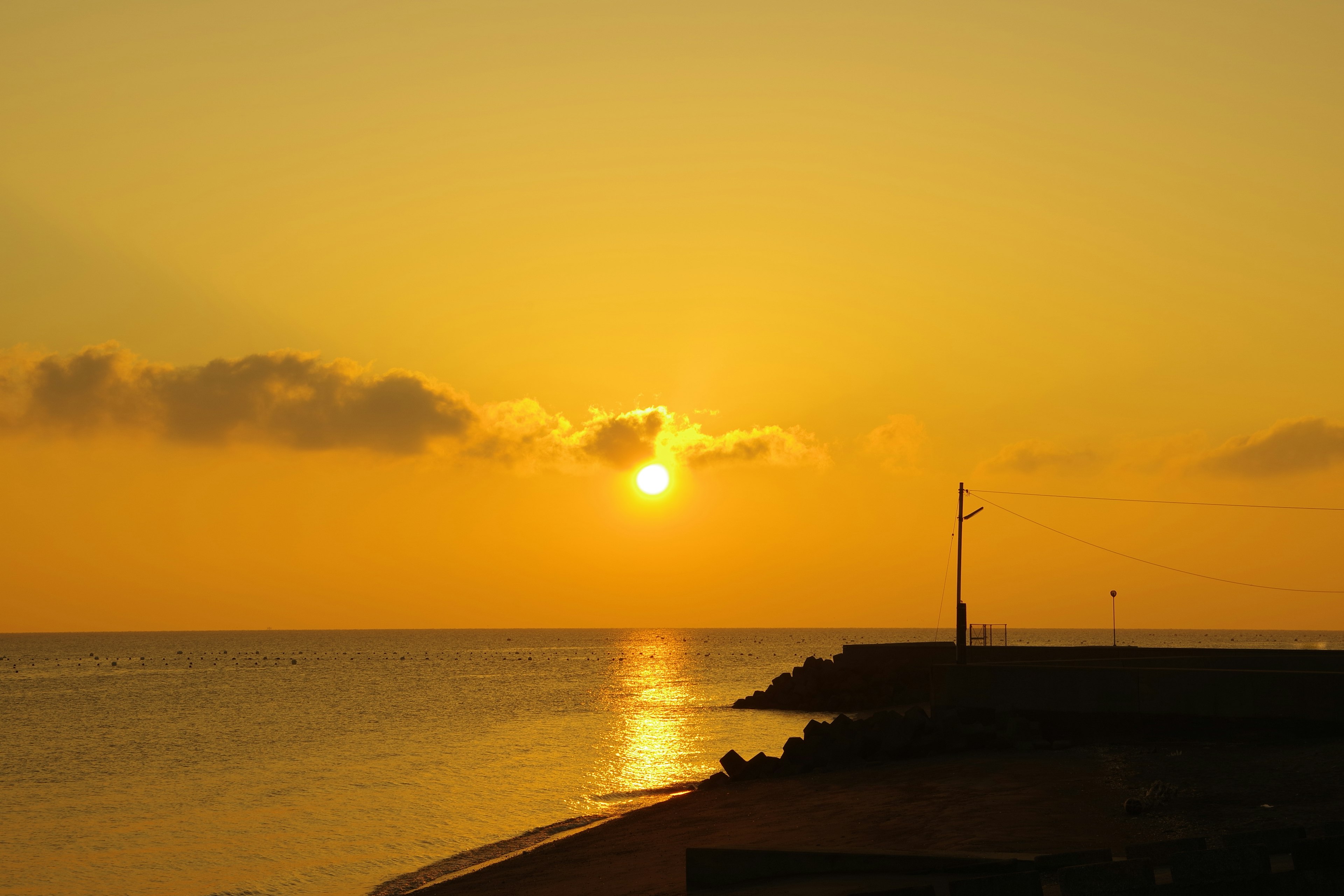 A beautiful scene of the sunset over the ocean