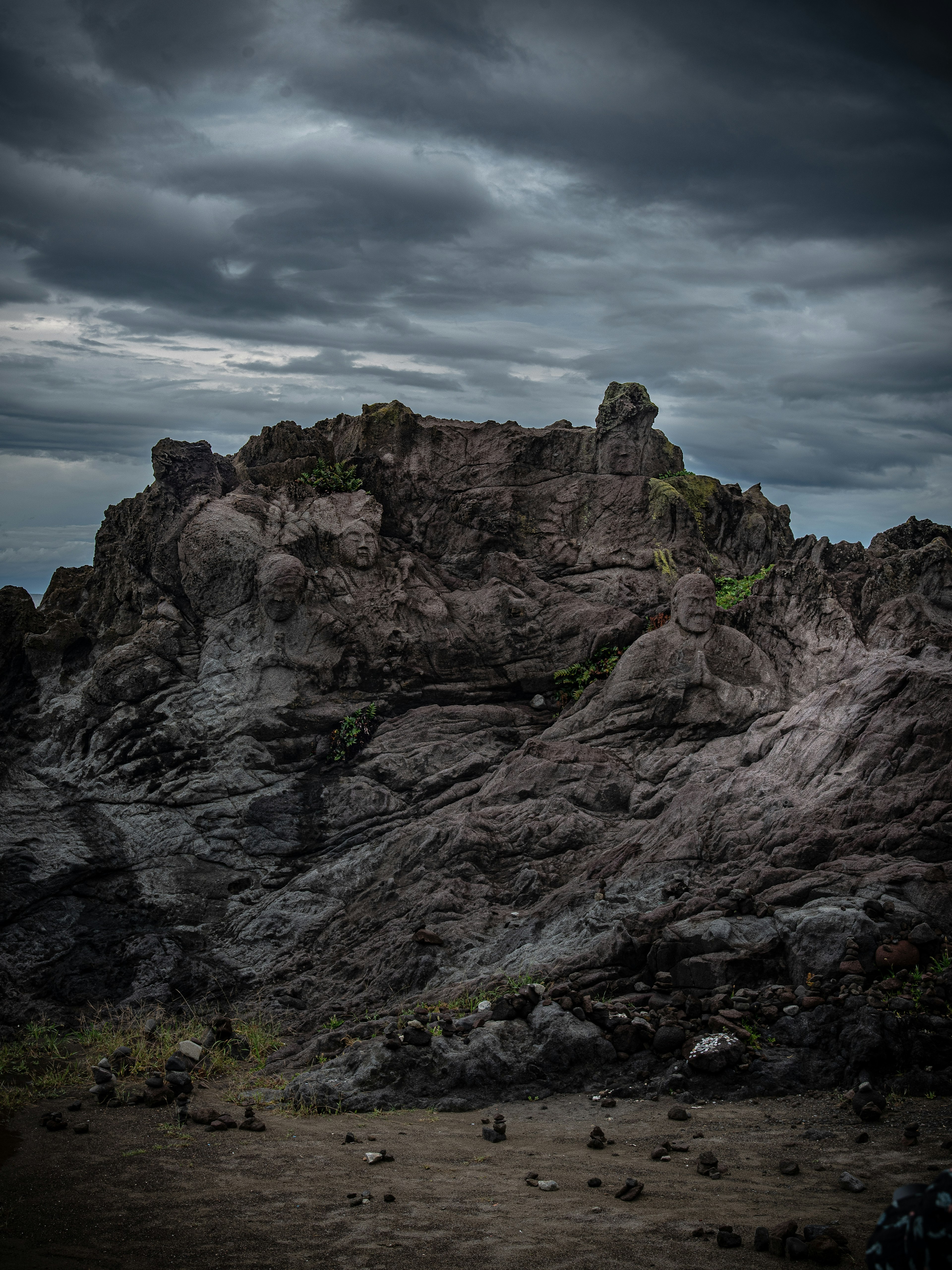 Rugged rocky landscape under dark clouds