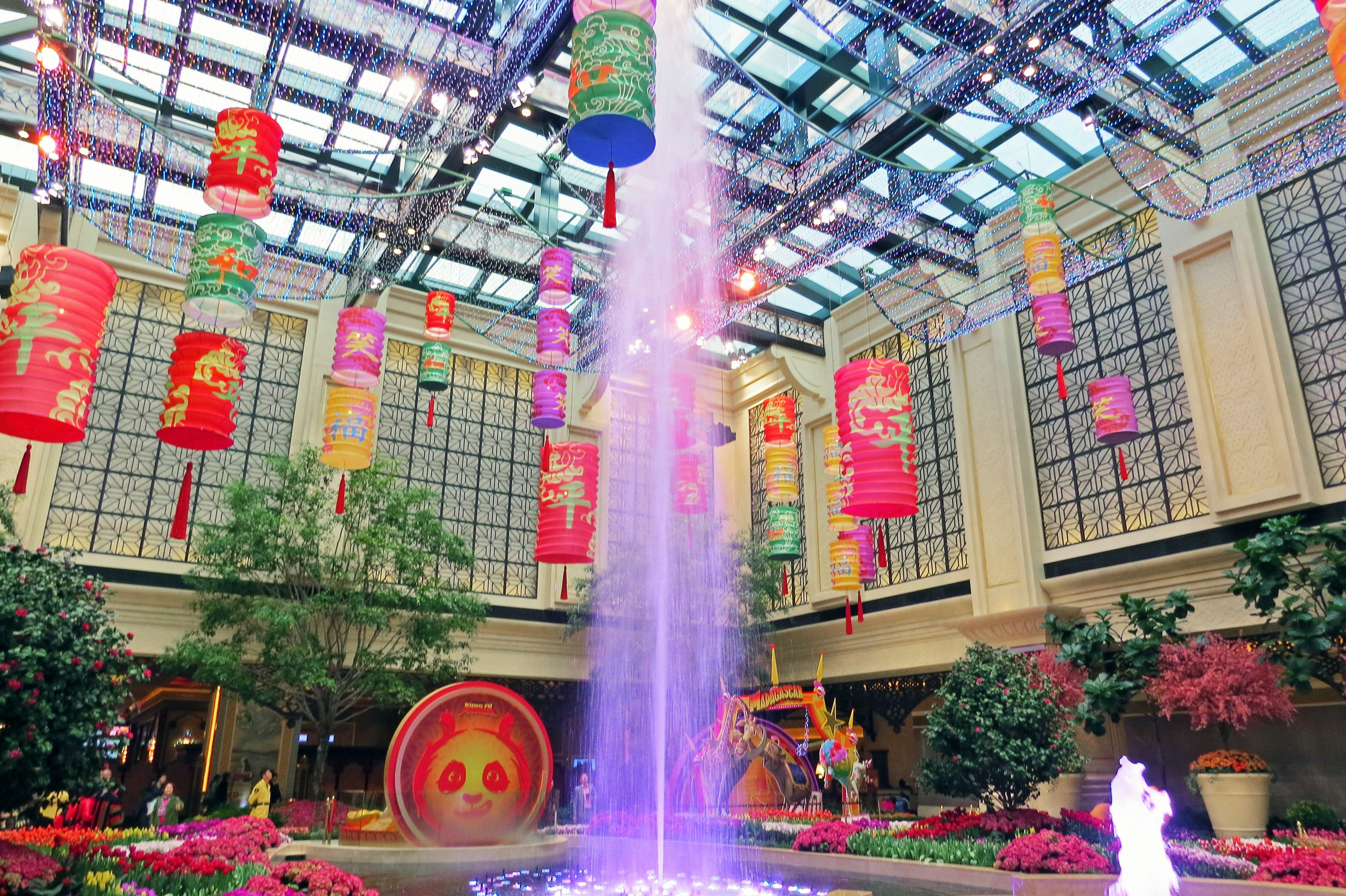 Indoor fountain with colorful lanterns and vibrant decorations