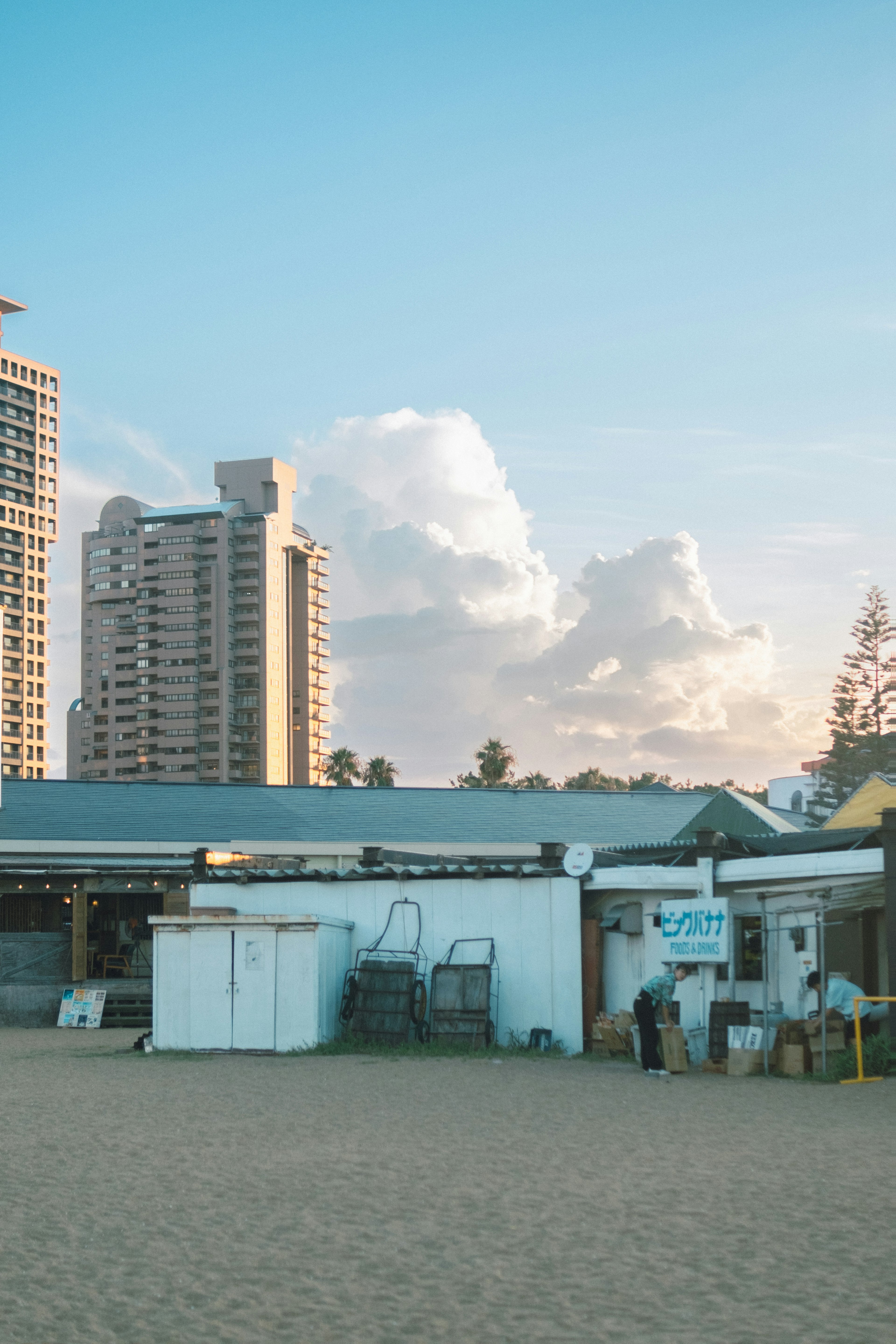 Beachfront scene with buildings and high-rise structures