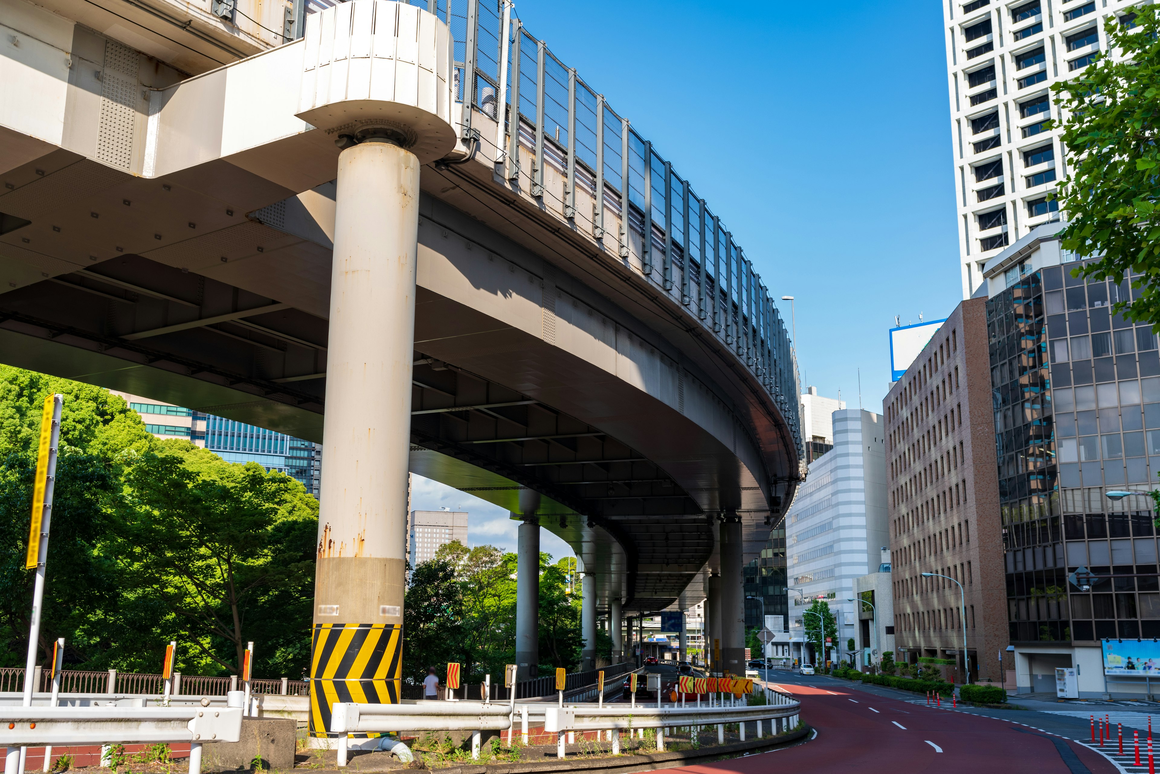 Urban elevated highway with surrounding buildings