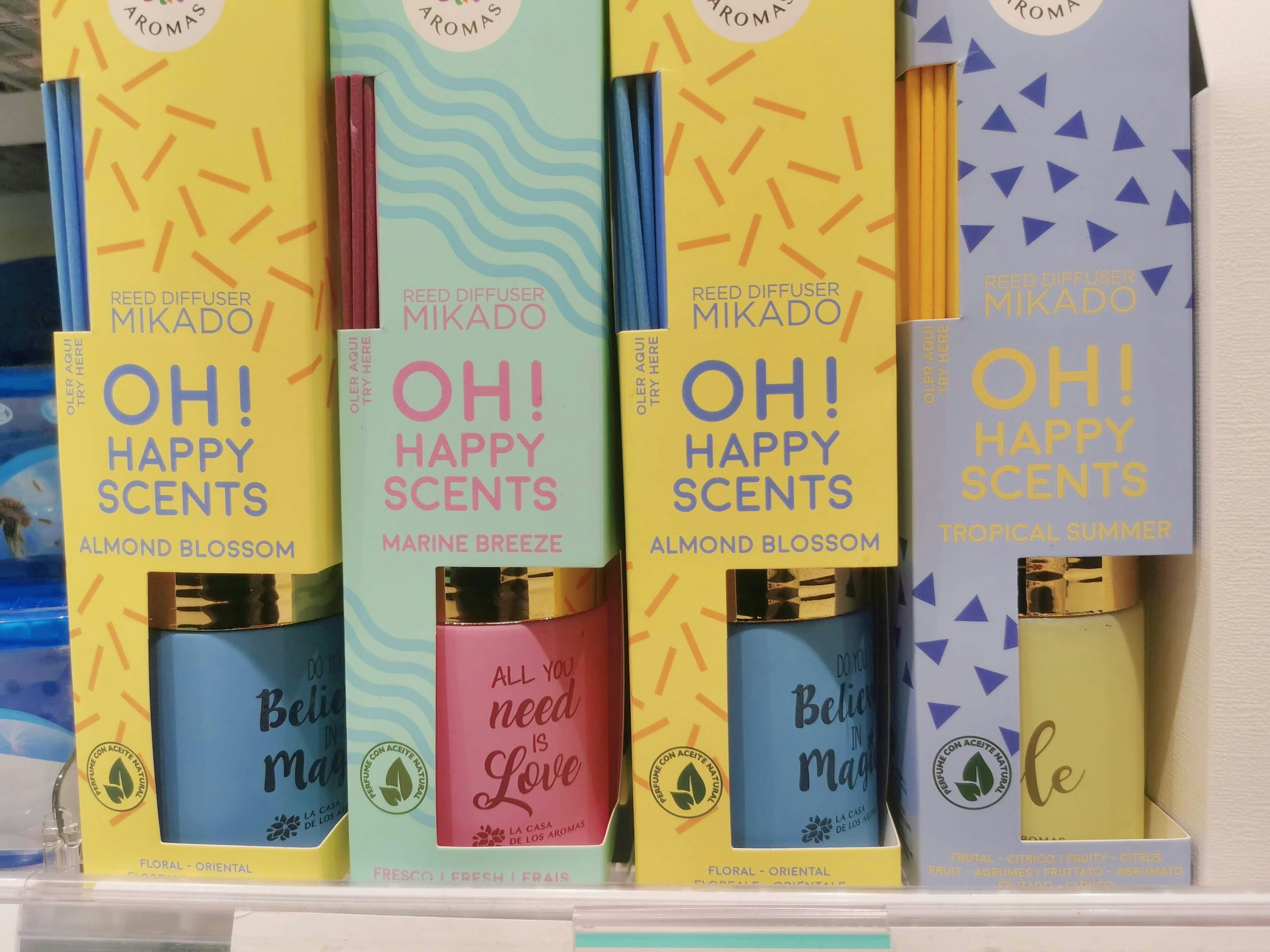 Colorful packaging of scented bottles lined up