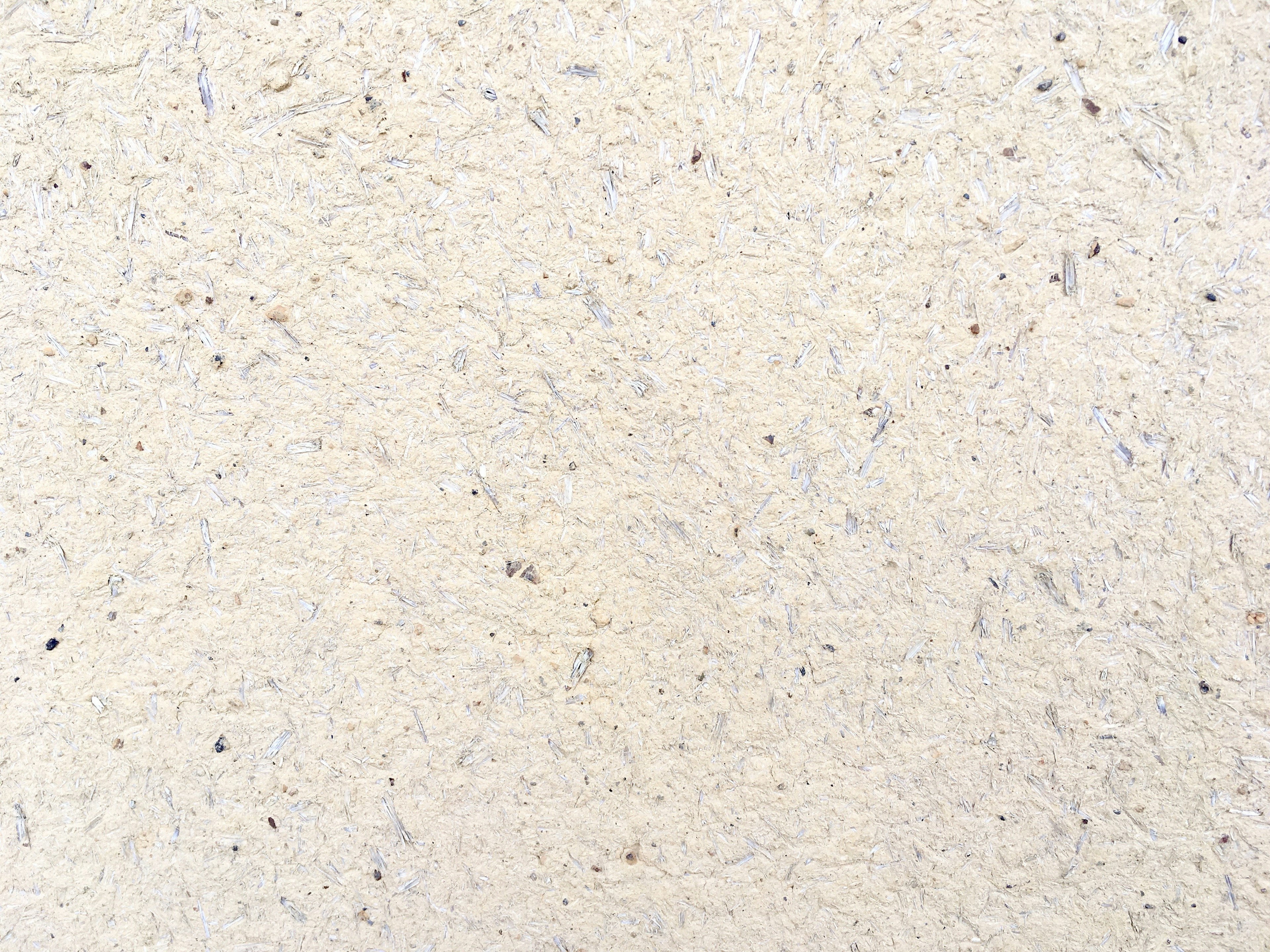 Textured cream-colored surface with subtle variations