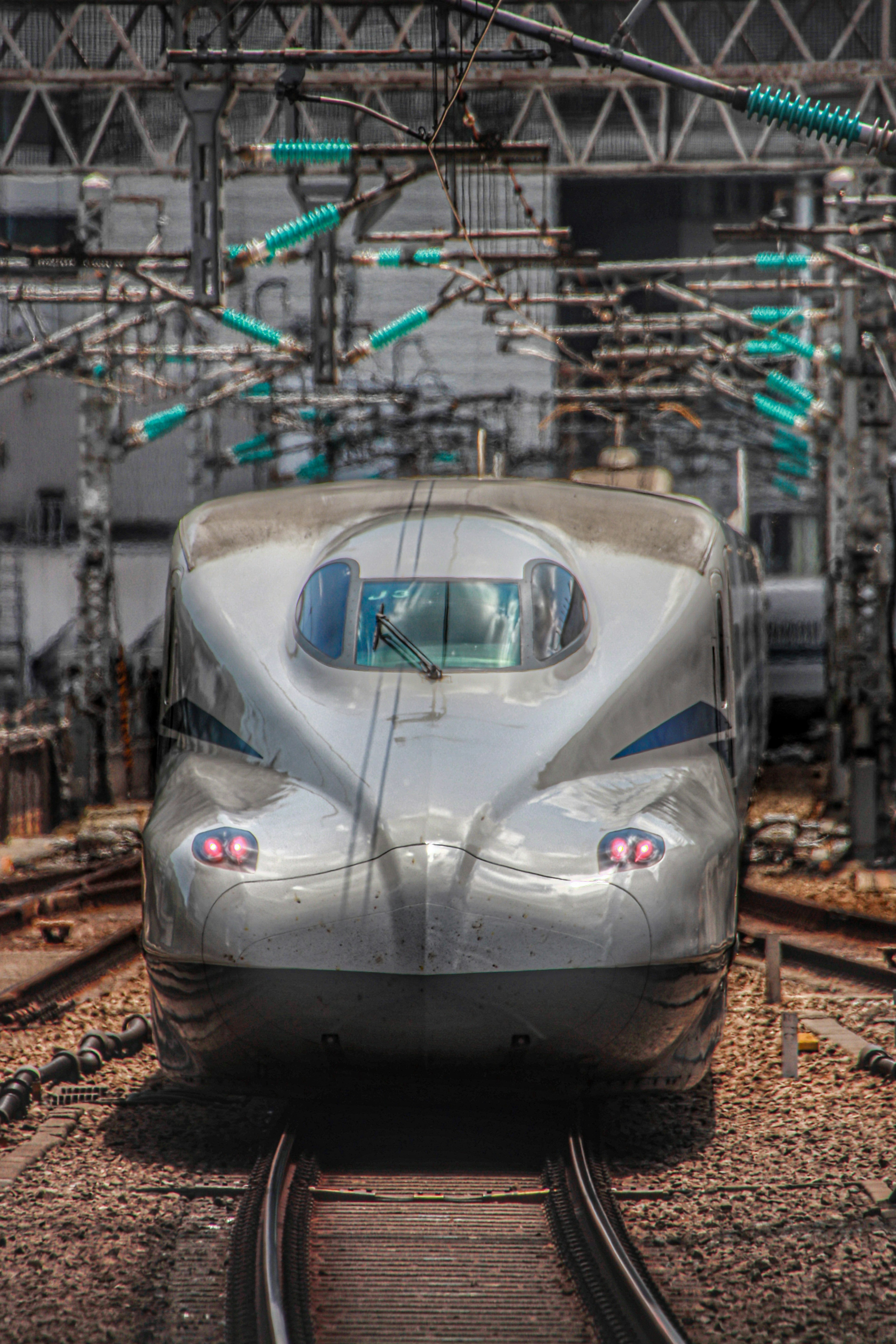 Front view of a Shinkansen train at a station