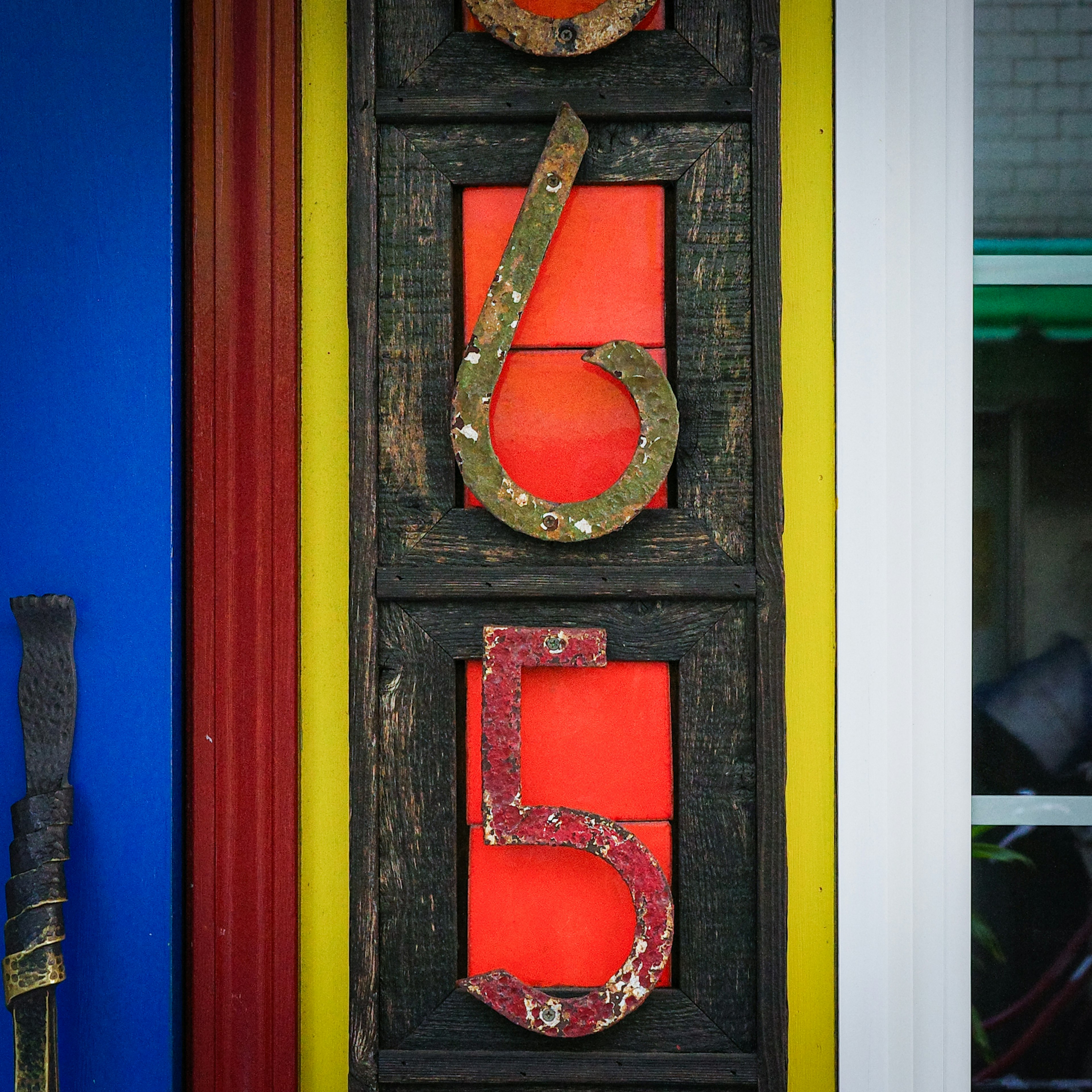 Colorful sign featuring vintage numbers 6 and 5