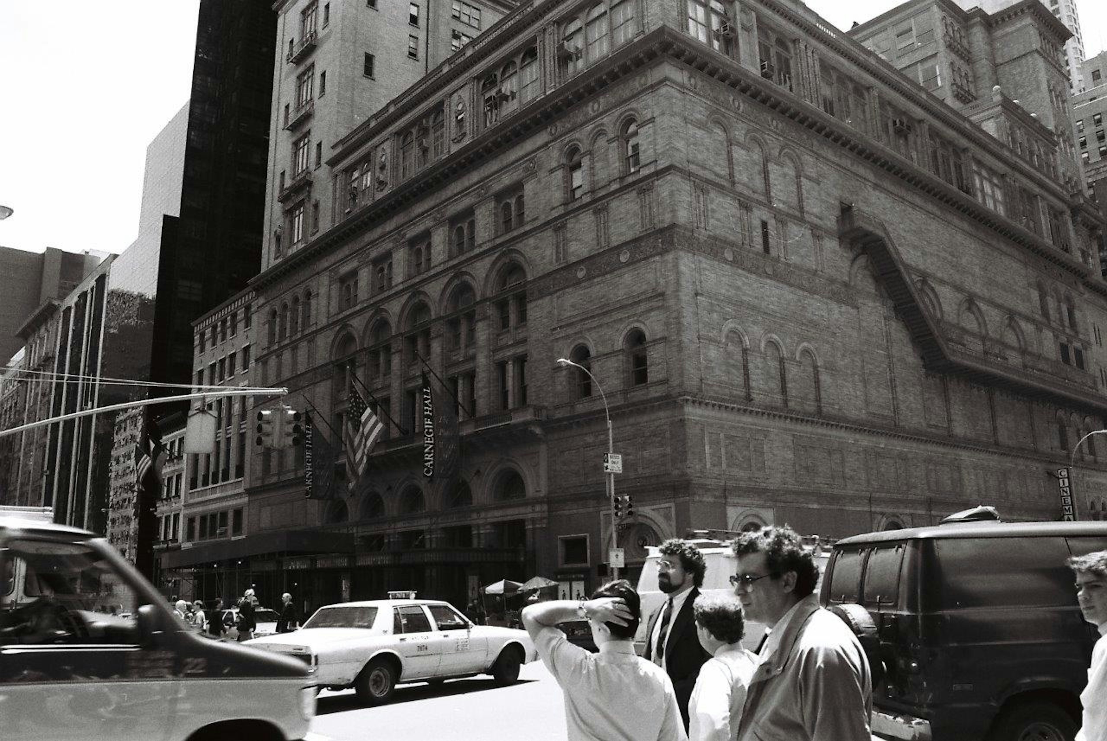 Exterior view of Carnegie Hall with pedestrians