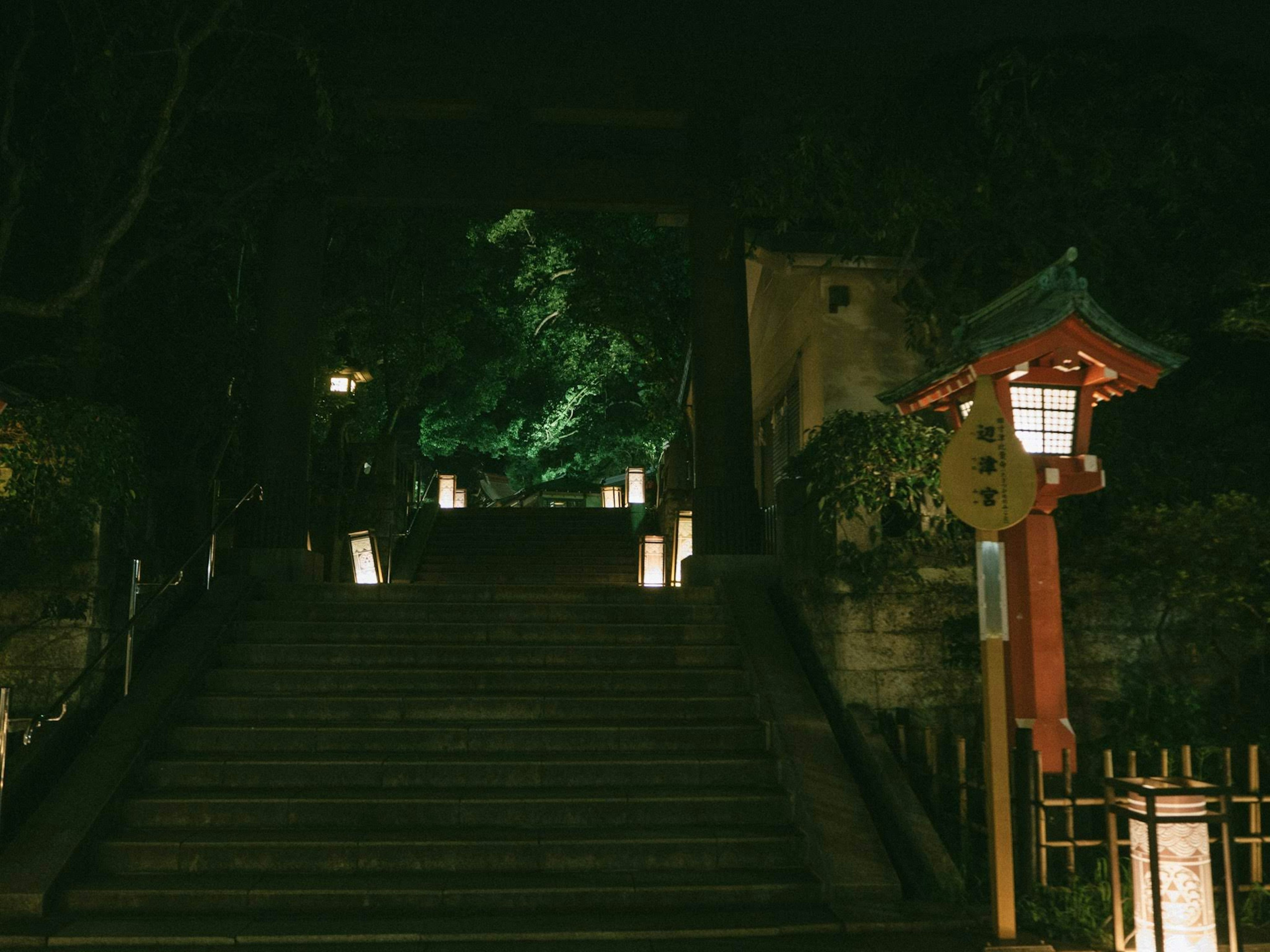 Night scene of stairs with lanterns