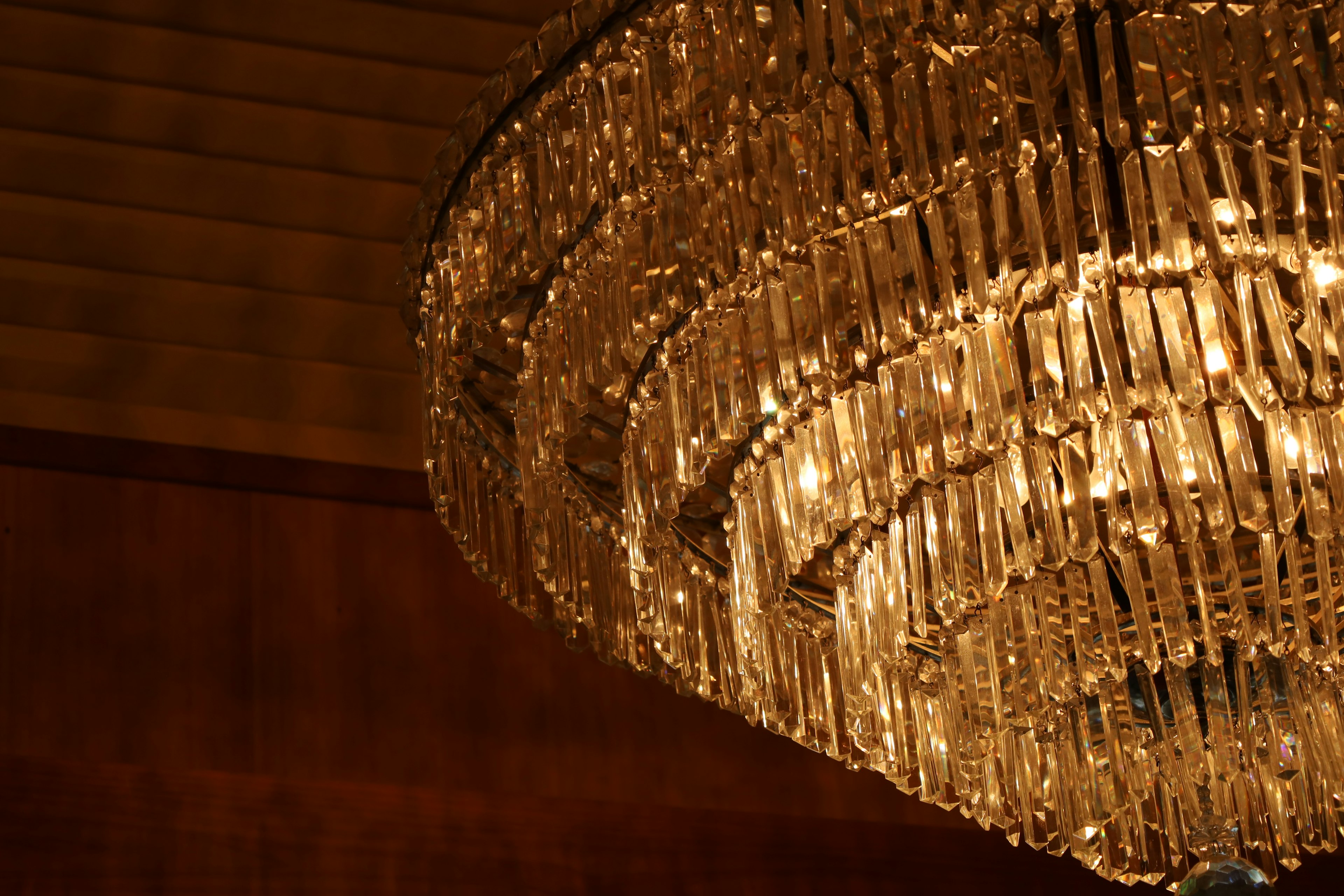 Elegant chandelier shining in a luxurious interior