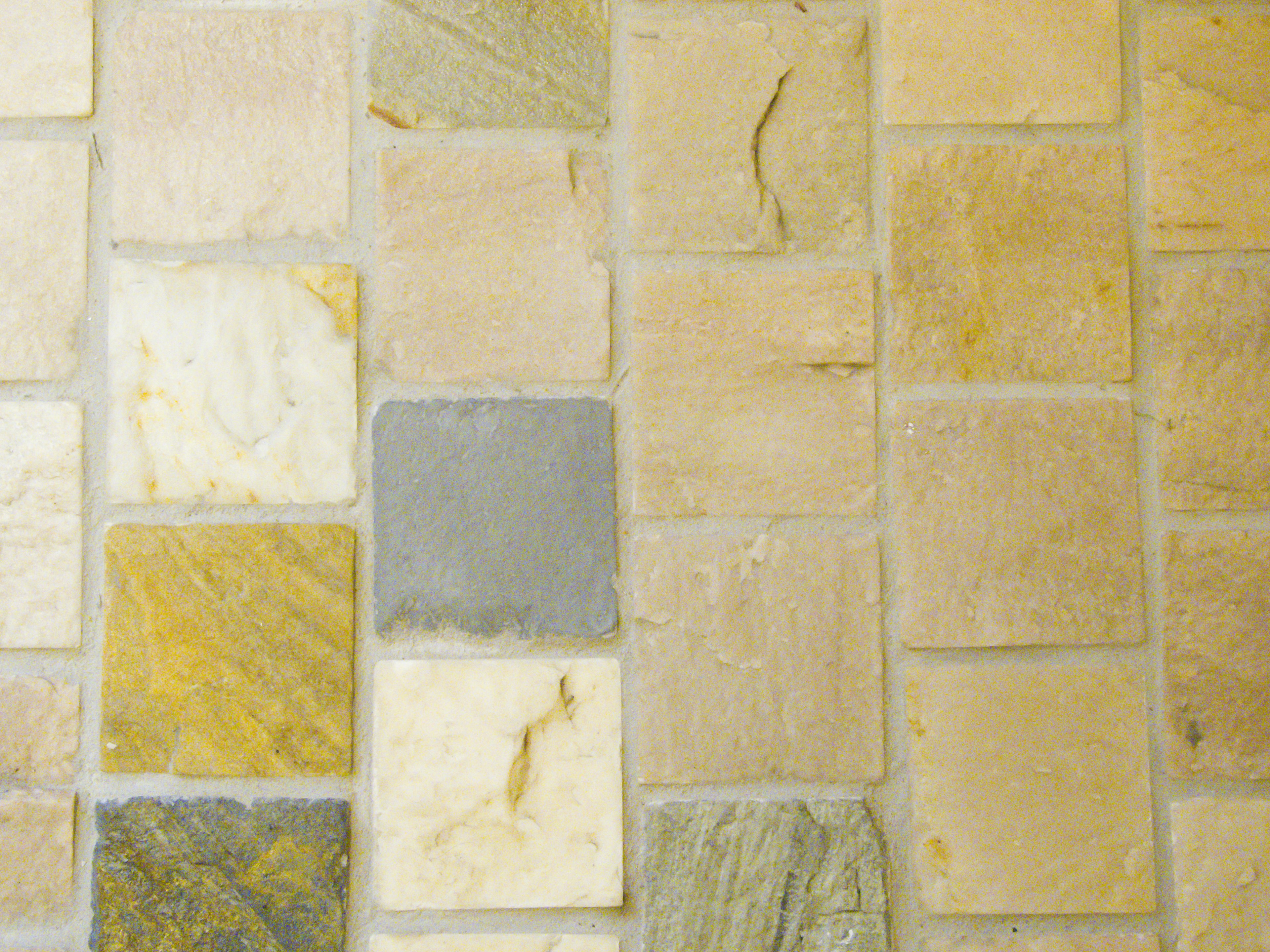 Pattern of various colored stone tiles arranged