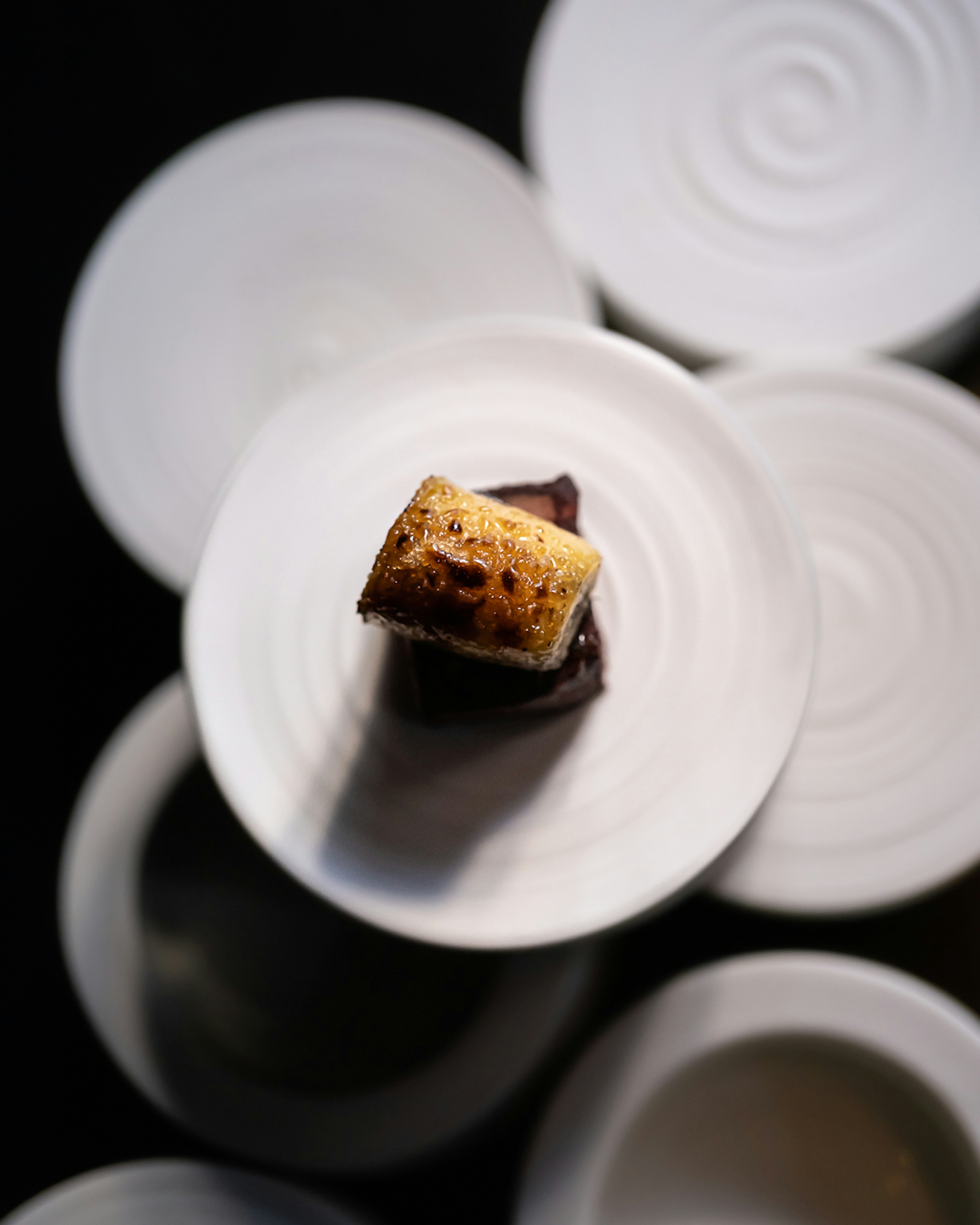 Close-up of a baked treat on a white plate