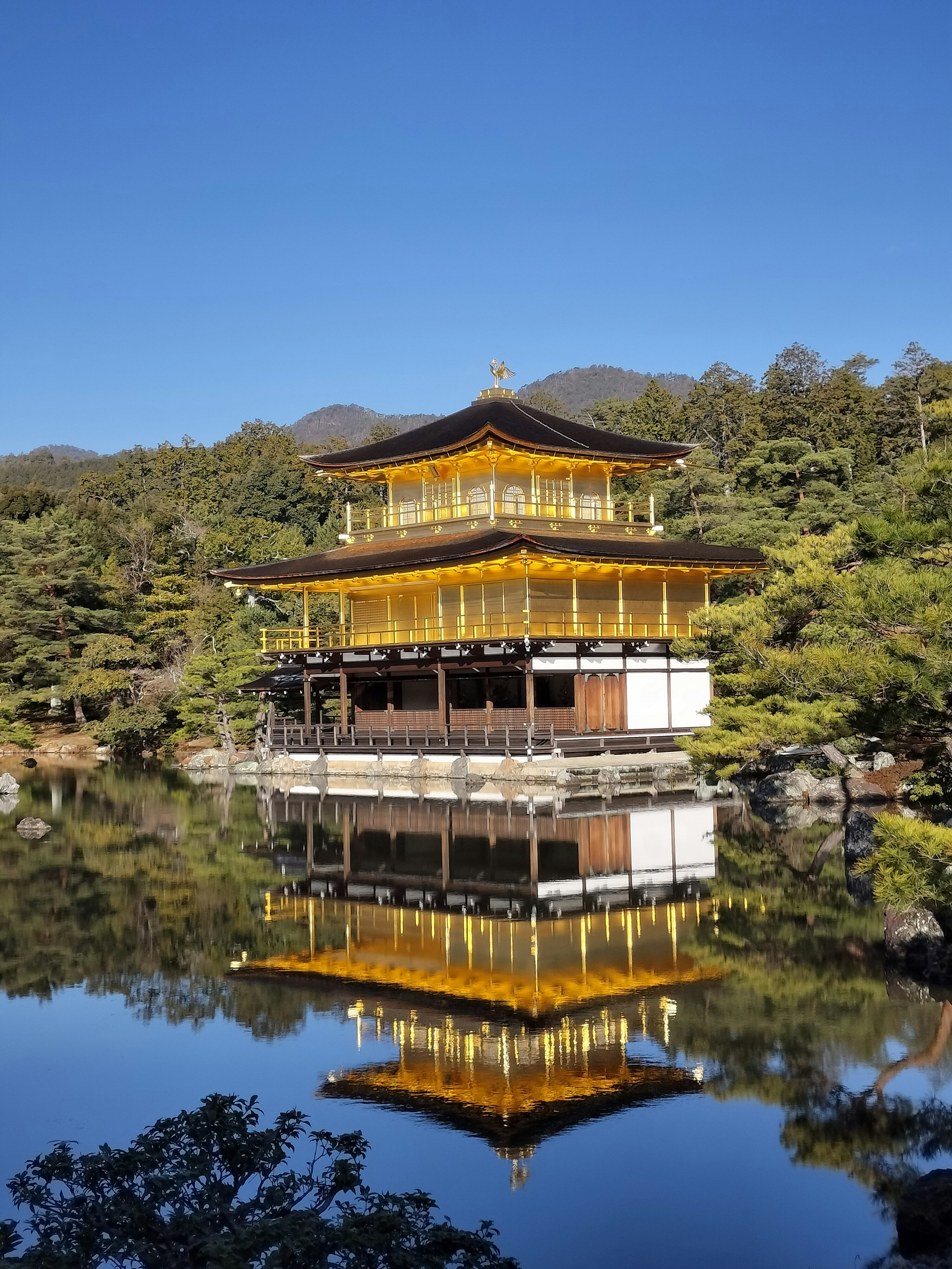 The beautiful view of Kinkaku-ji with its reflection in the pond