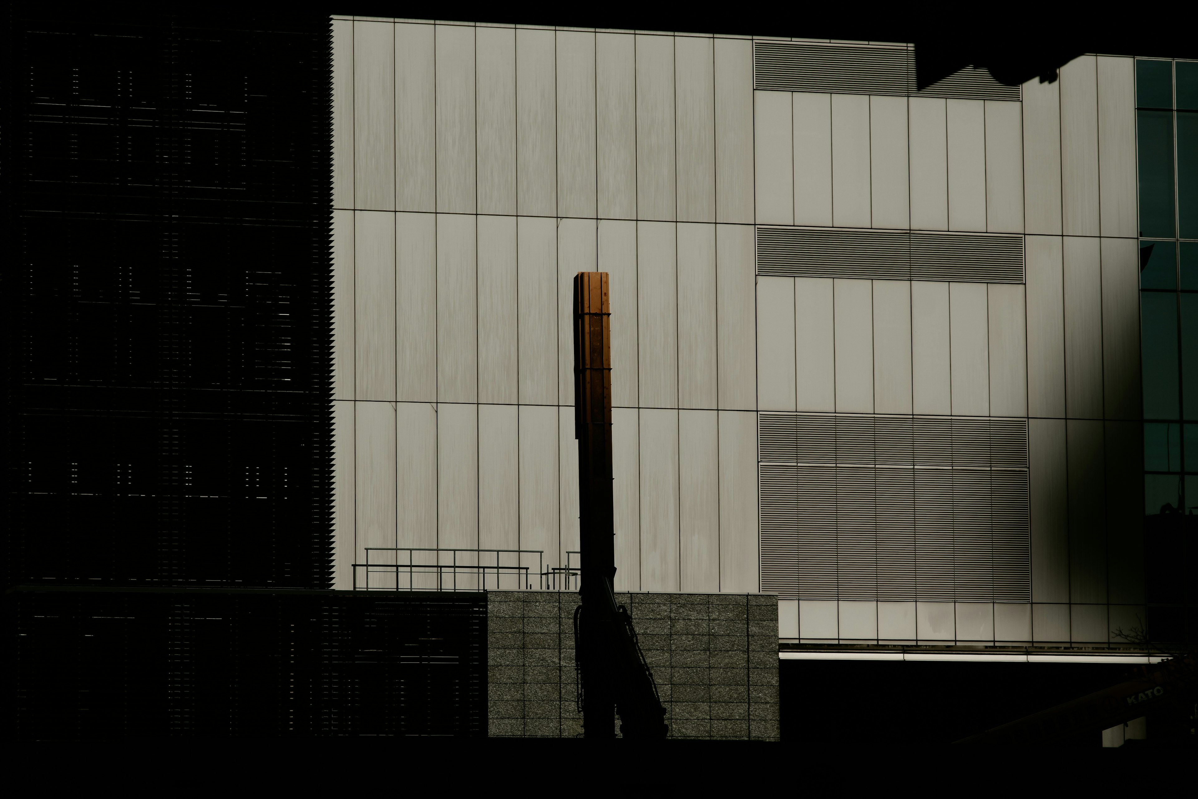 Contrast of modern building facade and shadows