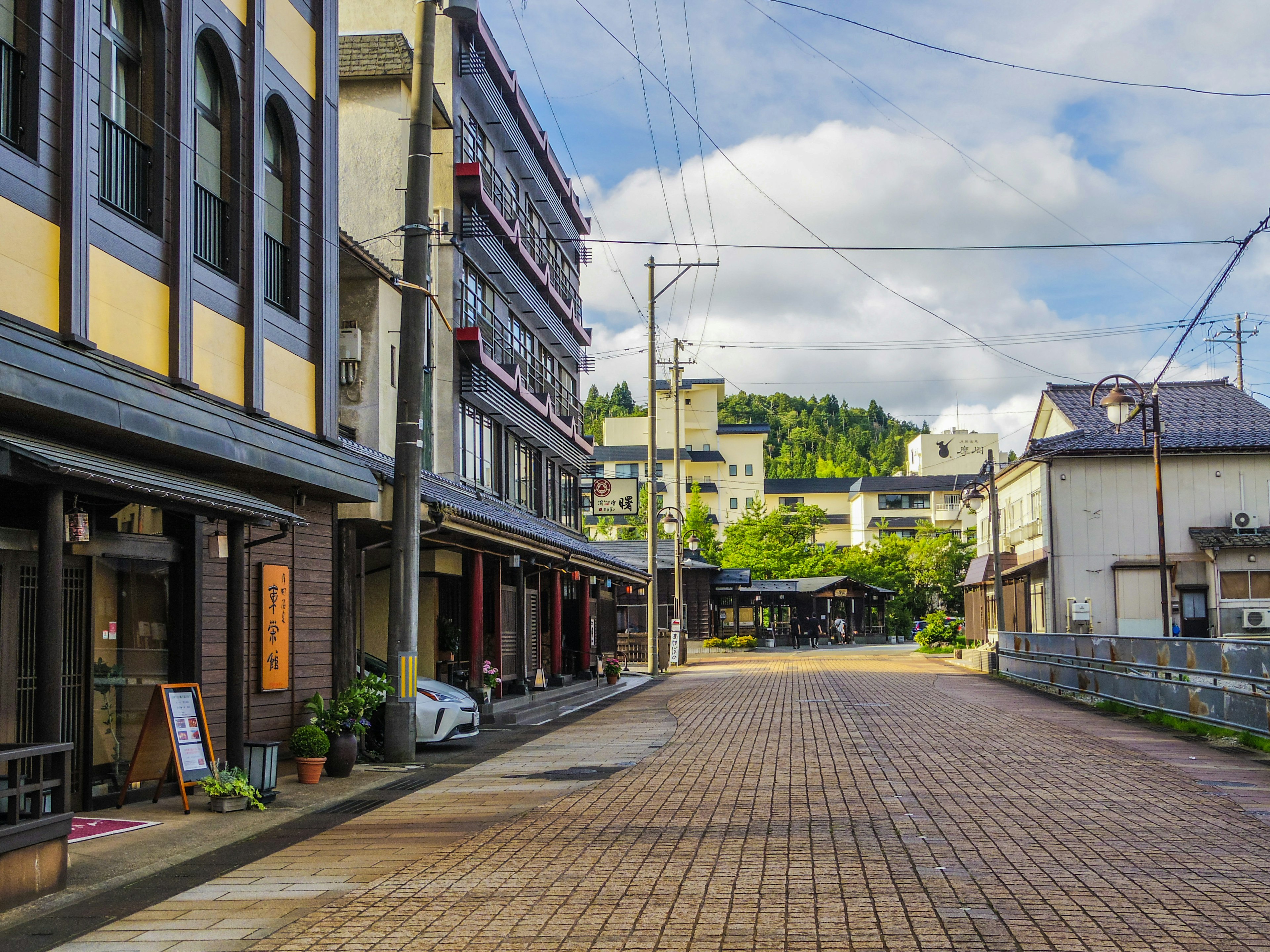 Quiet street scene with buildings and blue sky