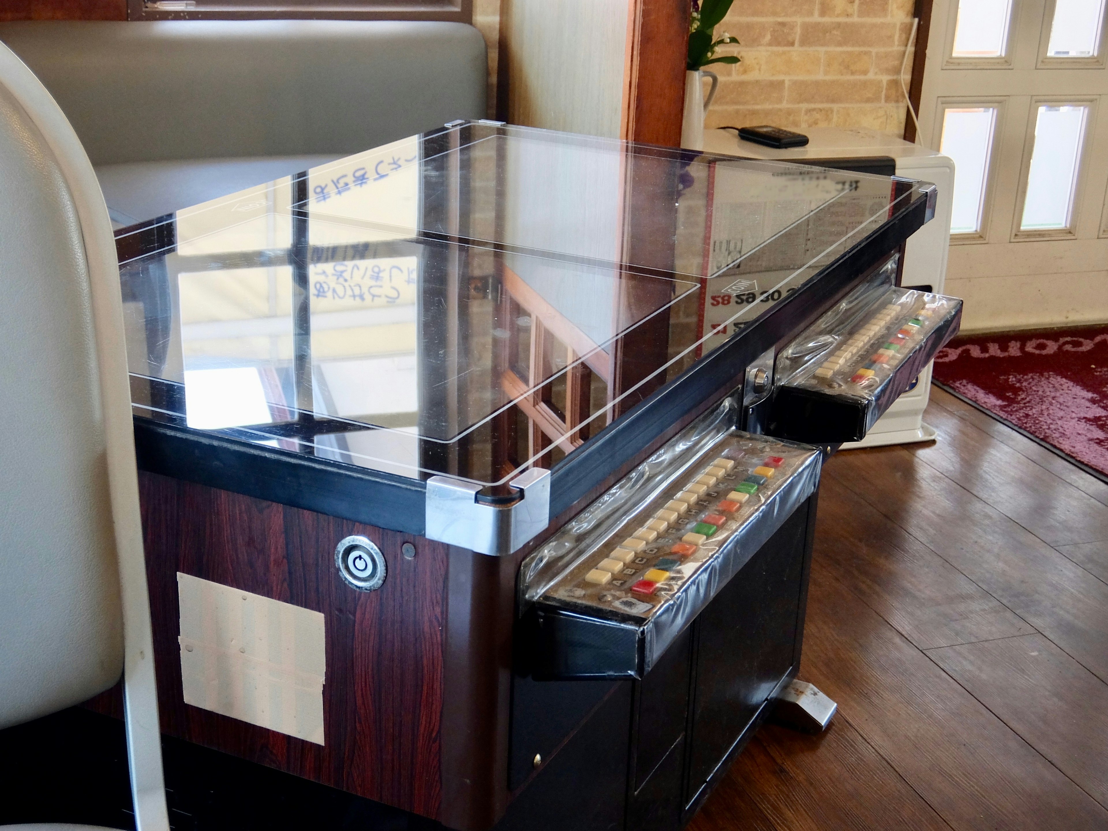 Elegant wooden table with a transparent glass top