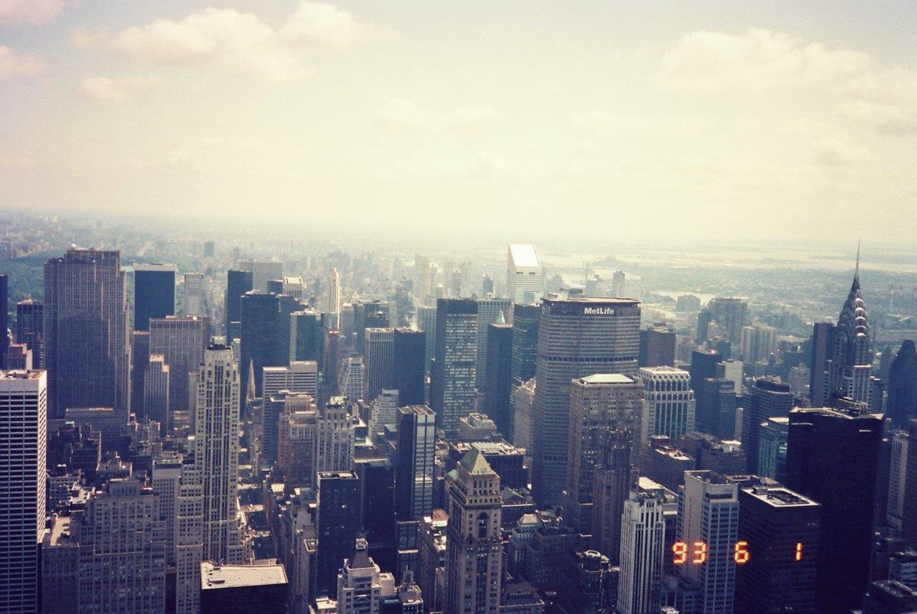 Aerial view of New York City's skyline with numerous skyscrapers