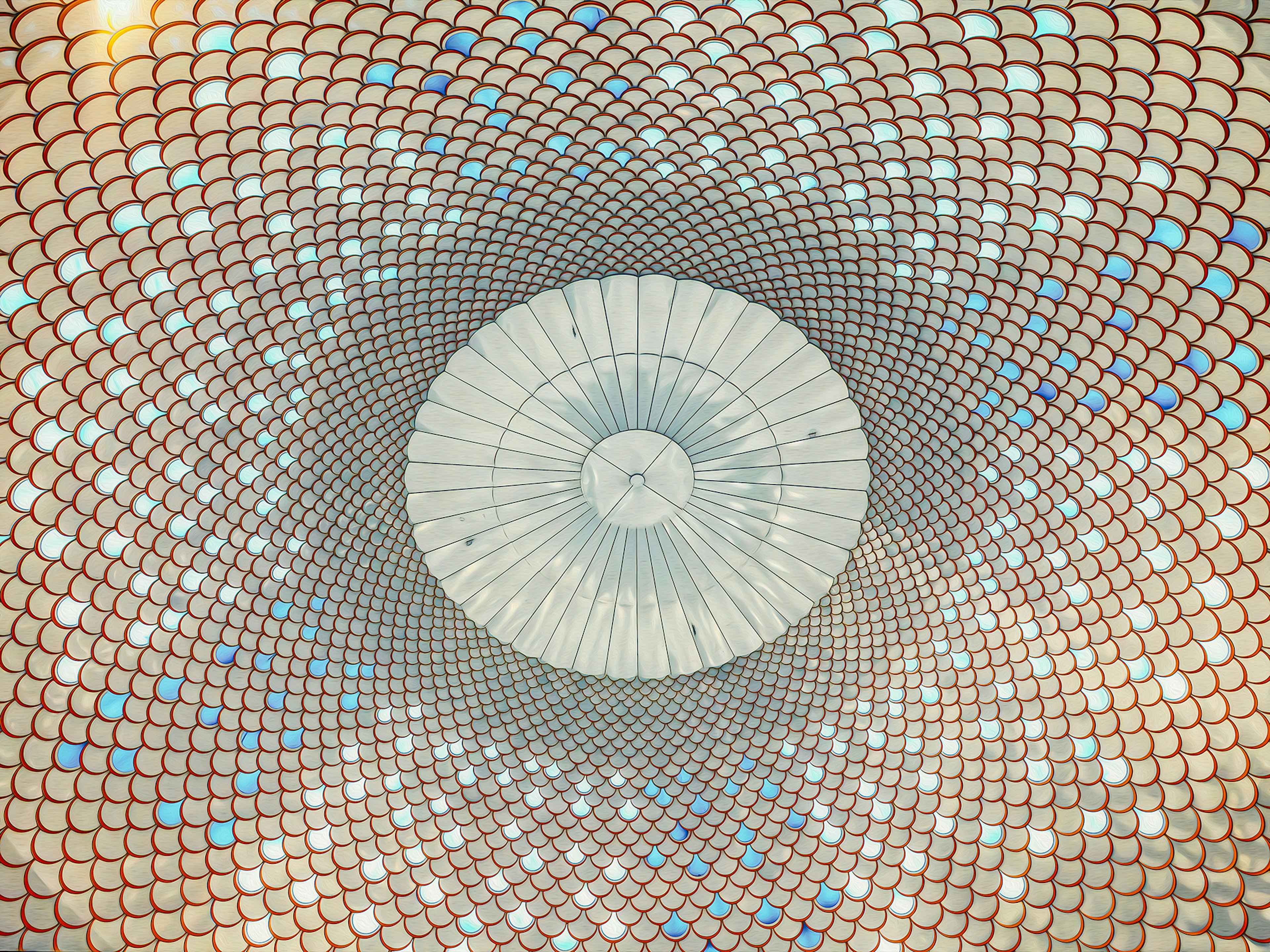 Conception de plafond en mosaïque circulaire avec des carreaux bleus et blancs formant un motif